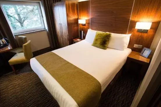 Bed in Mondo Hotel
