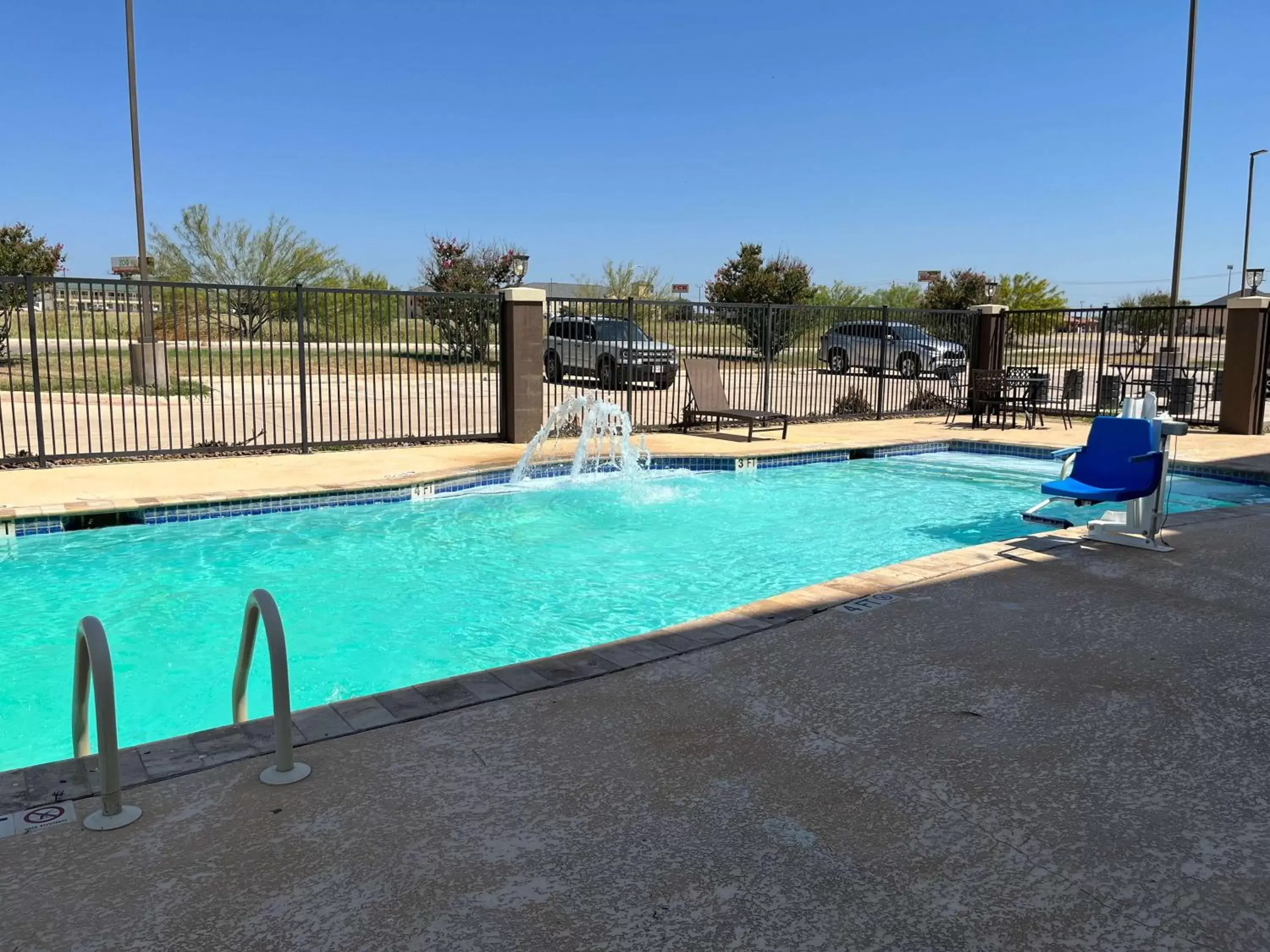 Pool view, Swimming Pool in Studio 6 Suites Pearsall, TX