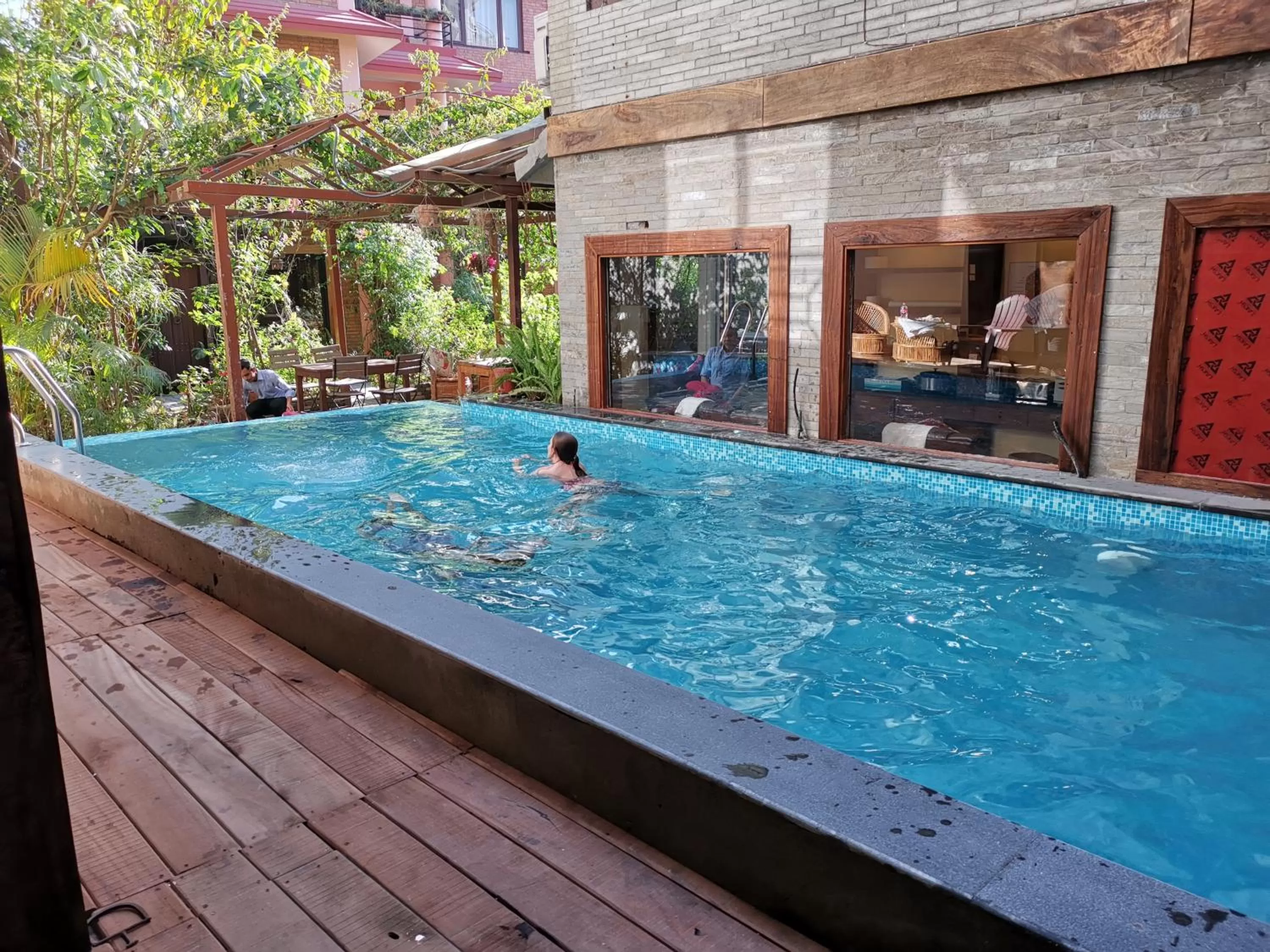 Swimming pool in Hotel Middle Path & Spa