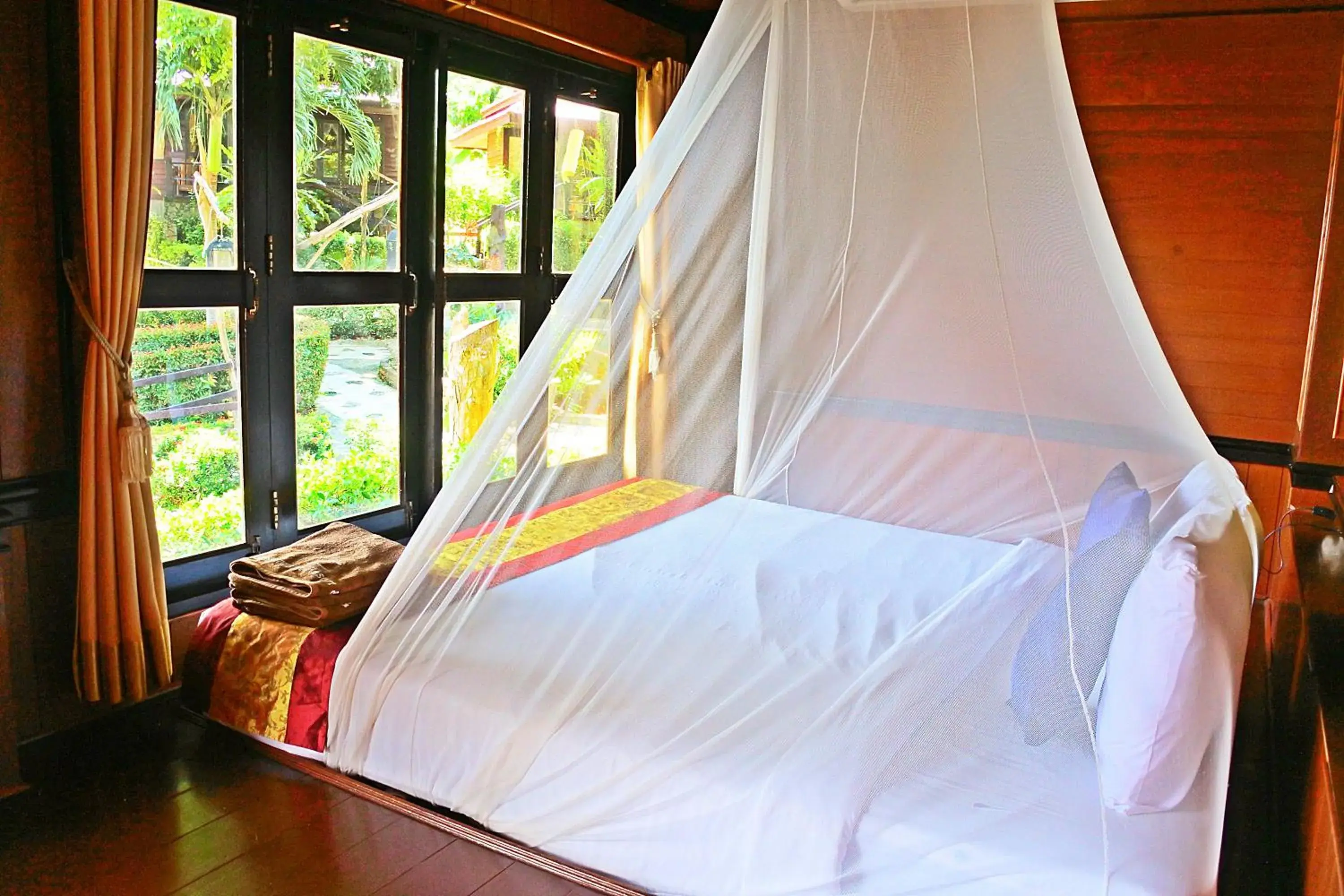 Bed in Baan Laanta Resort & Spa - SHA PLUS