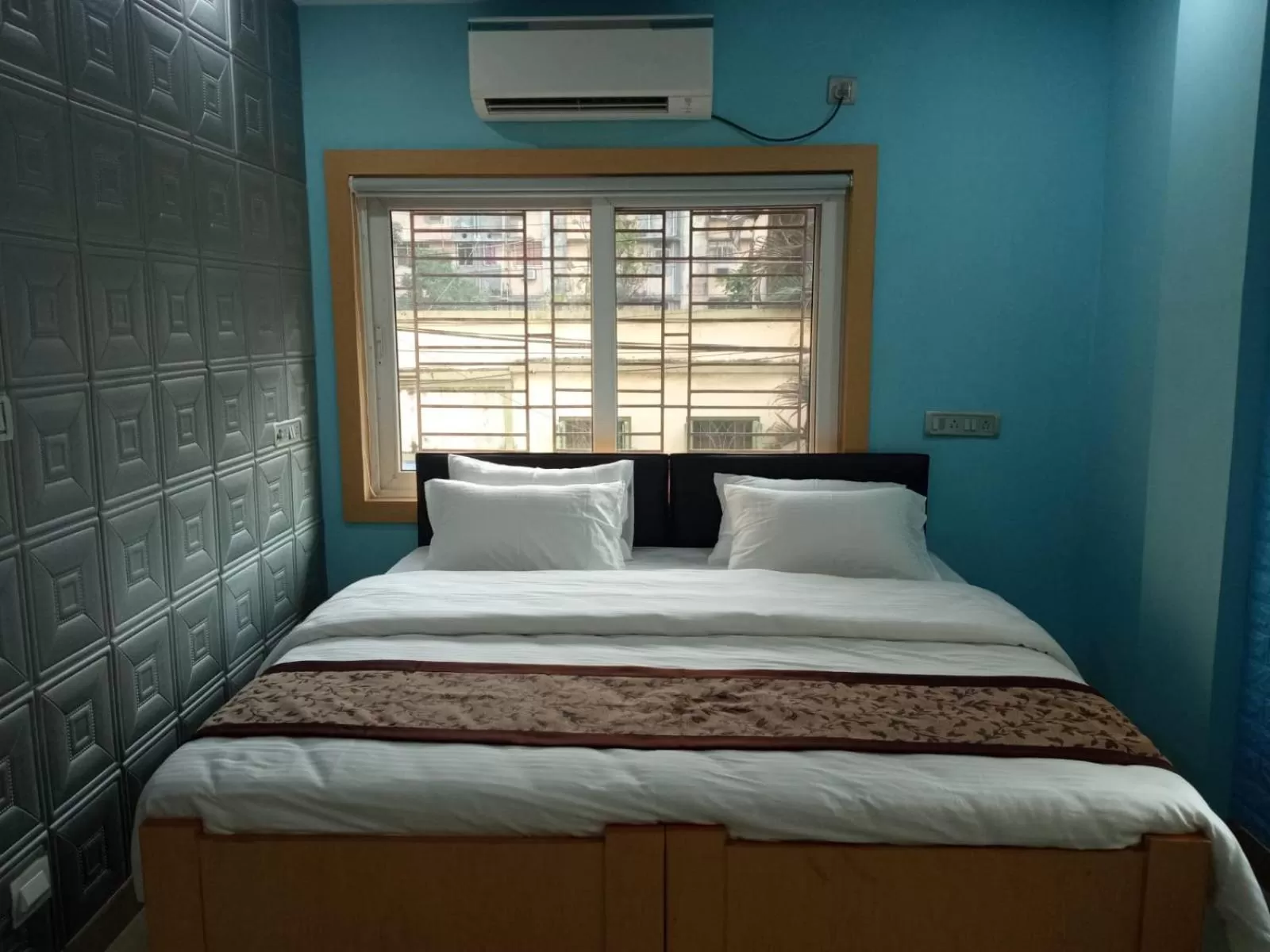 Bed in Soukyam Hotel