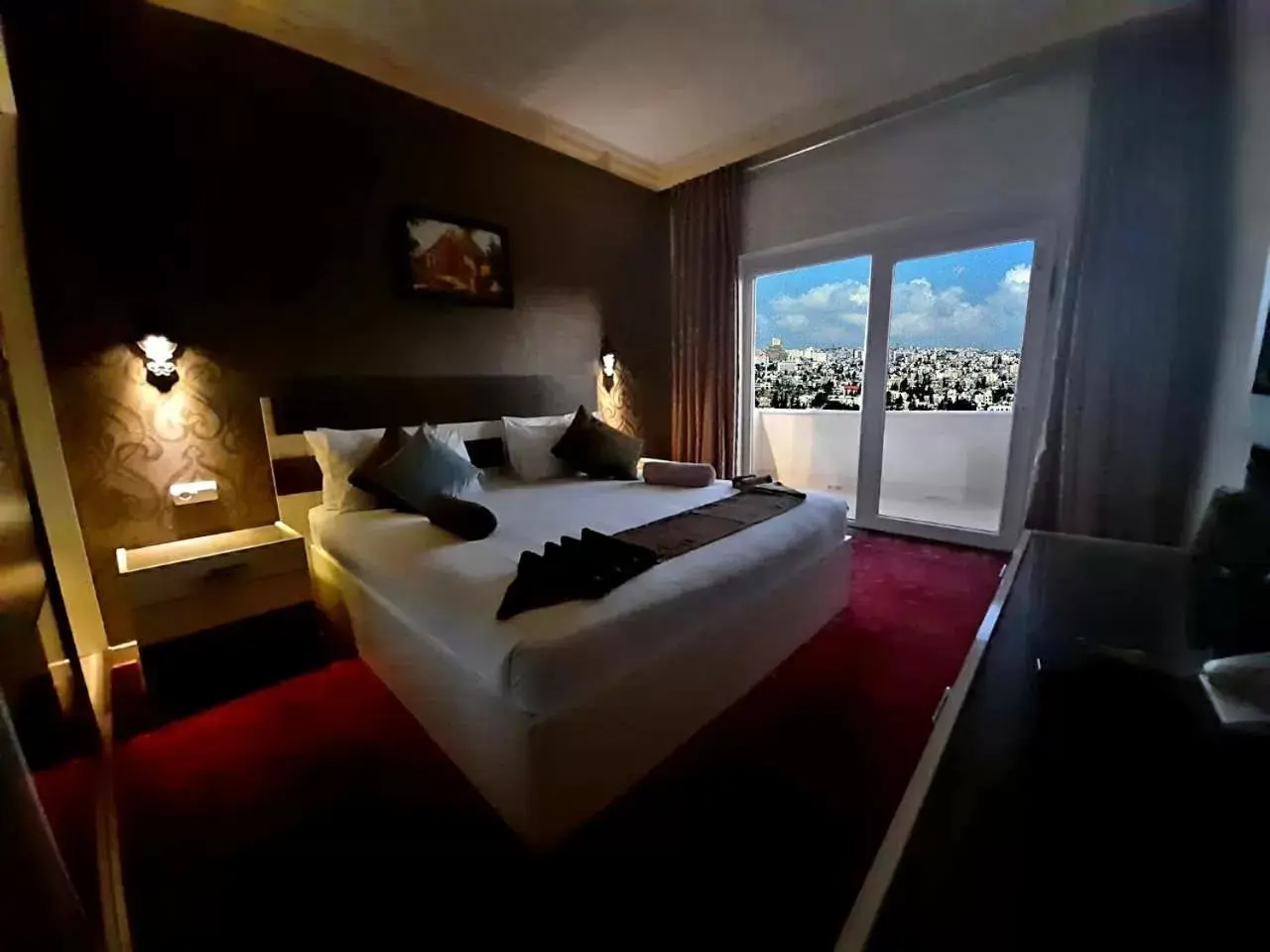 Bed in Balcony Hotel