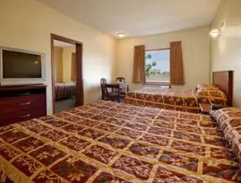 Queen Suite with Three Queen Beds - Non-Smoking in Super 8 by Wyndham Fort Saskatchewan