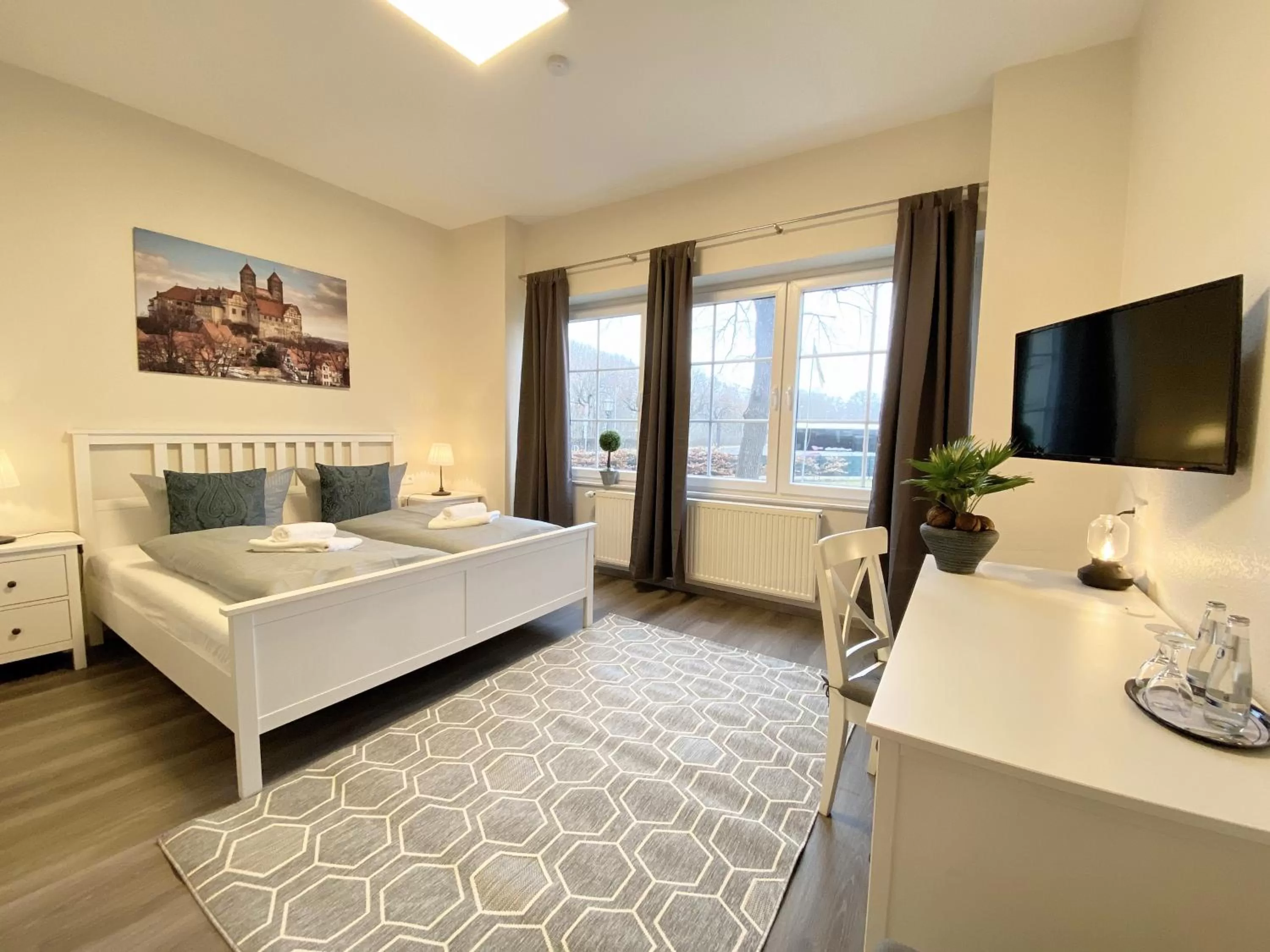 Photo of the whole room, Bed in REGIOHOTEL Quedlinburger Hof - #HistorischerCharme #ZentraleLage #Wellness #FreeParking