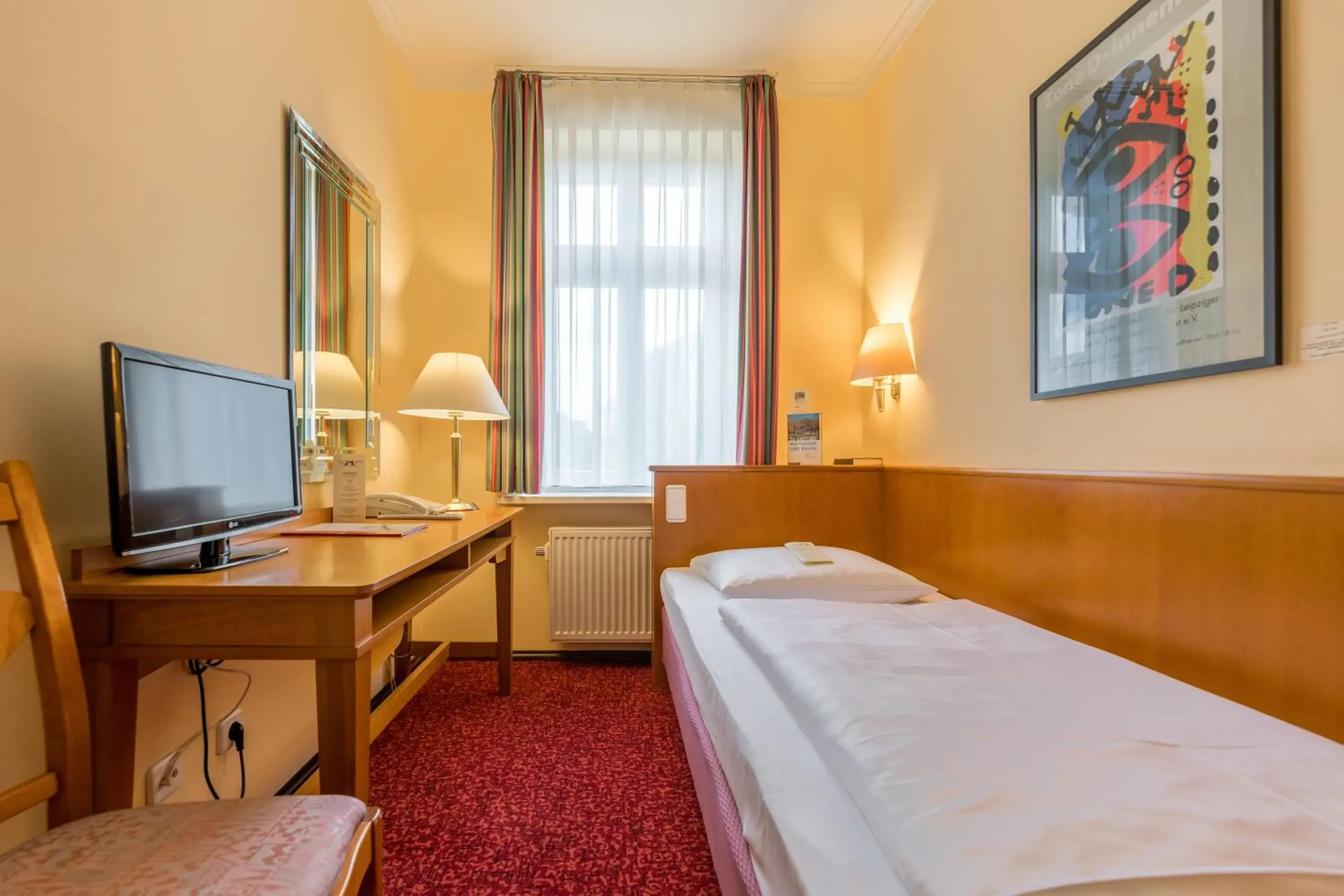 Photo of the whole room, Bed in Galerie Hotel Leipziger Hof