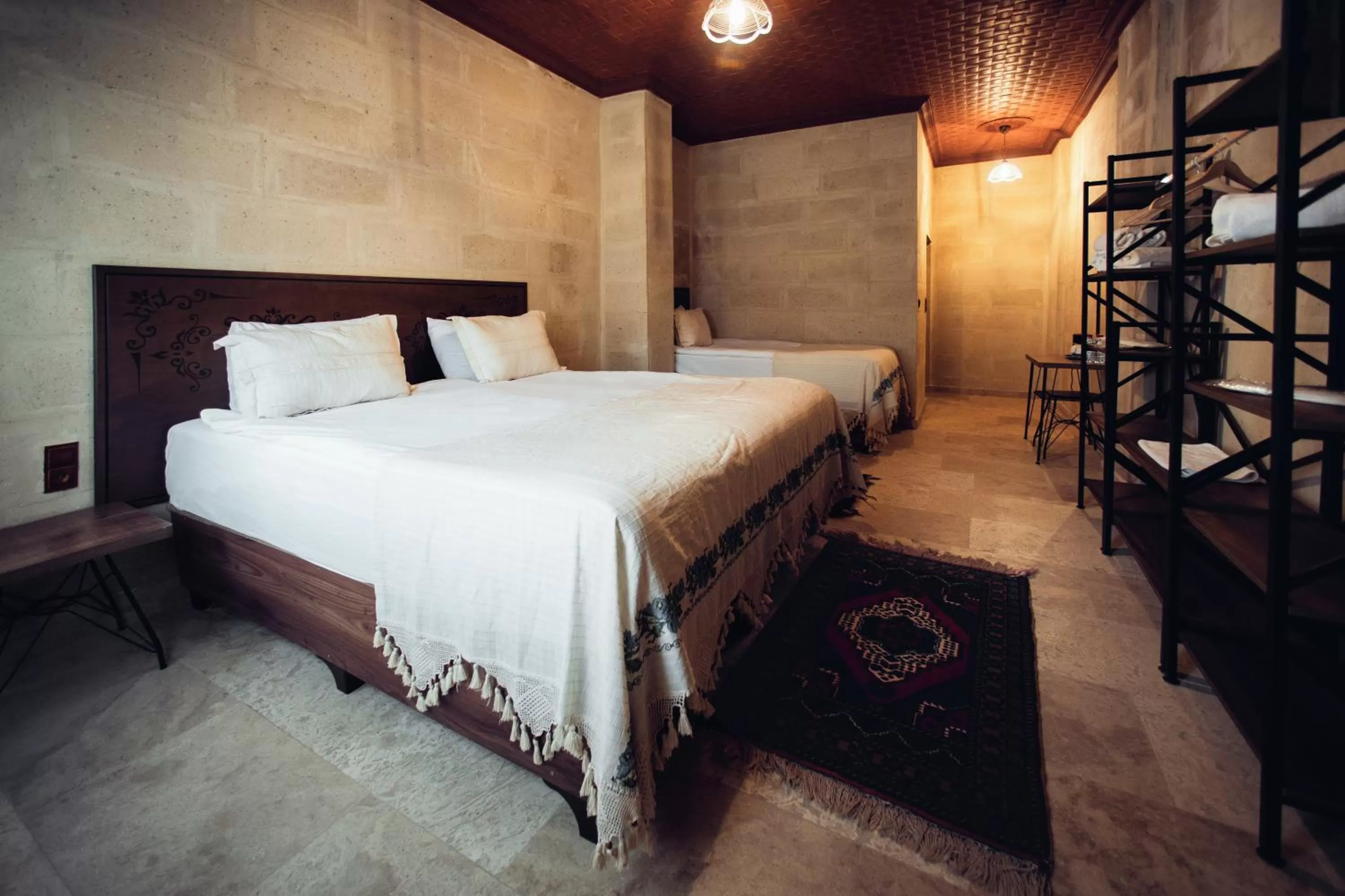 Bed in Azalea Terrace Cave Hotel