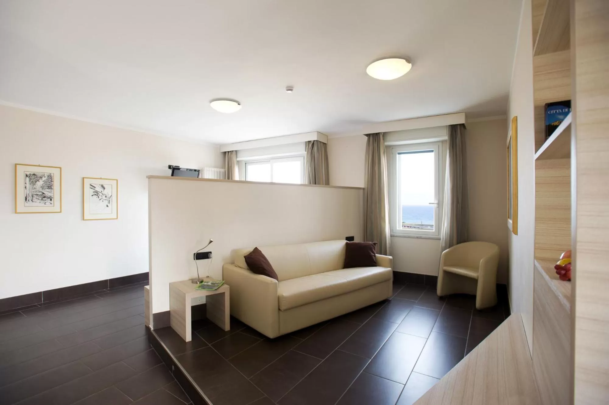 Seating area in Excelsior Hotel E Appartamenti