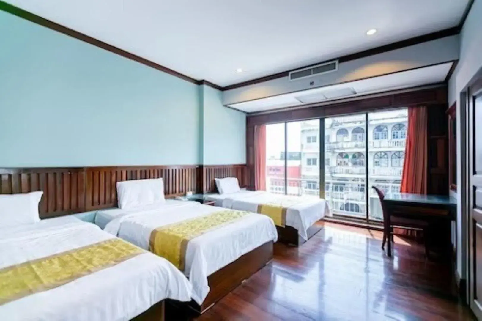Bed in The President Hotel at Chokchai 4