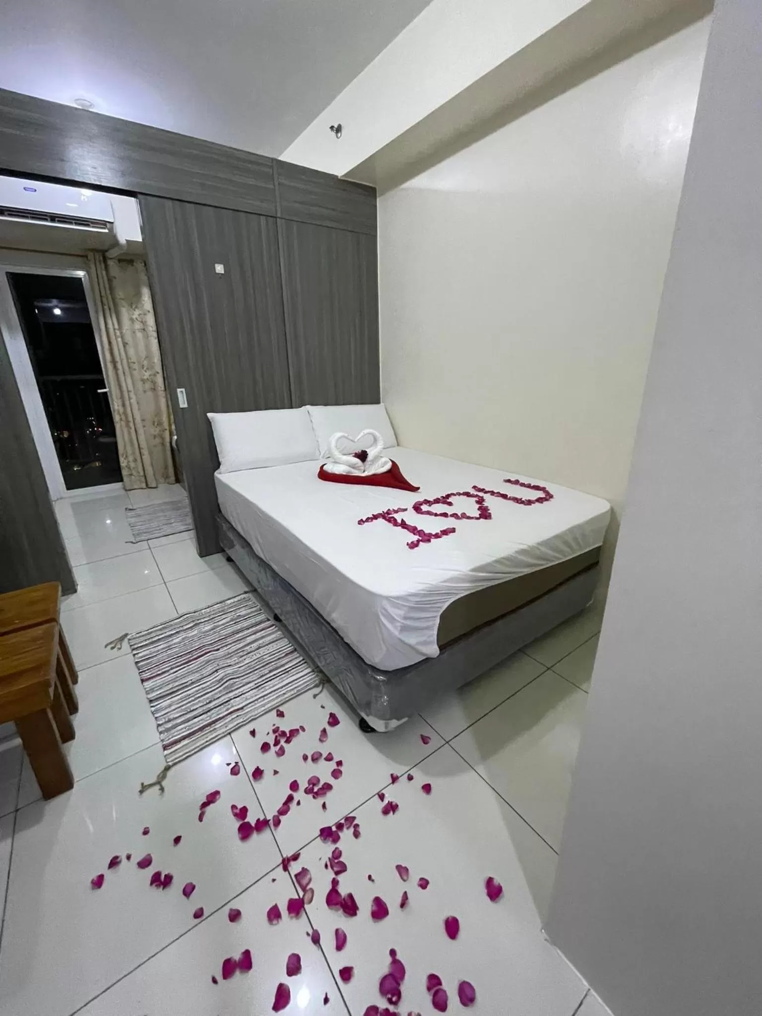 Bed in Green Residences Stays by PBYY