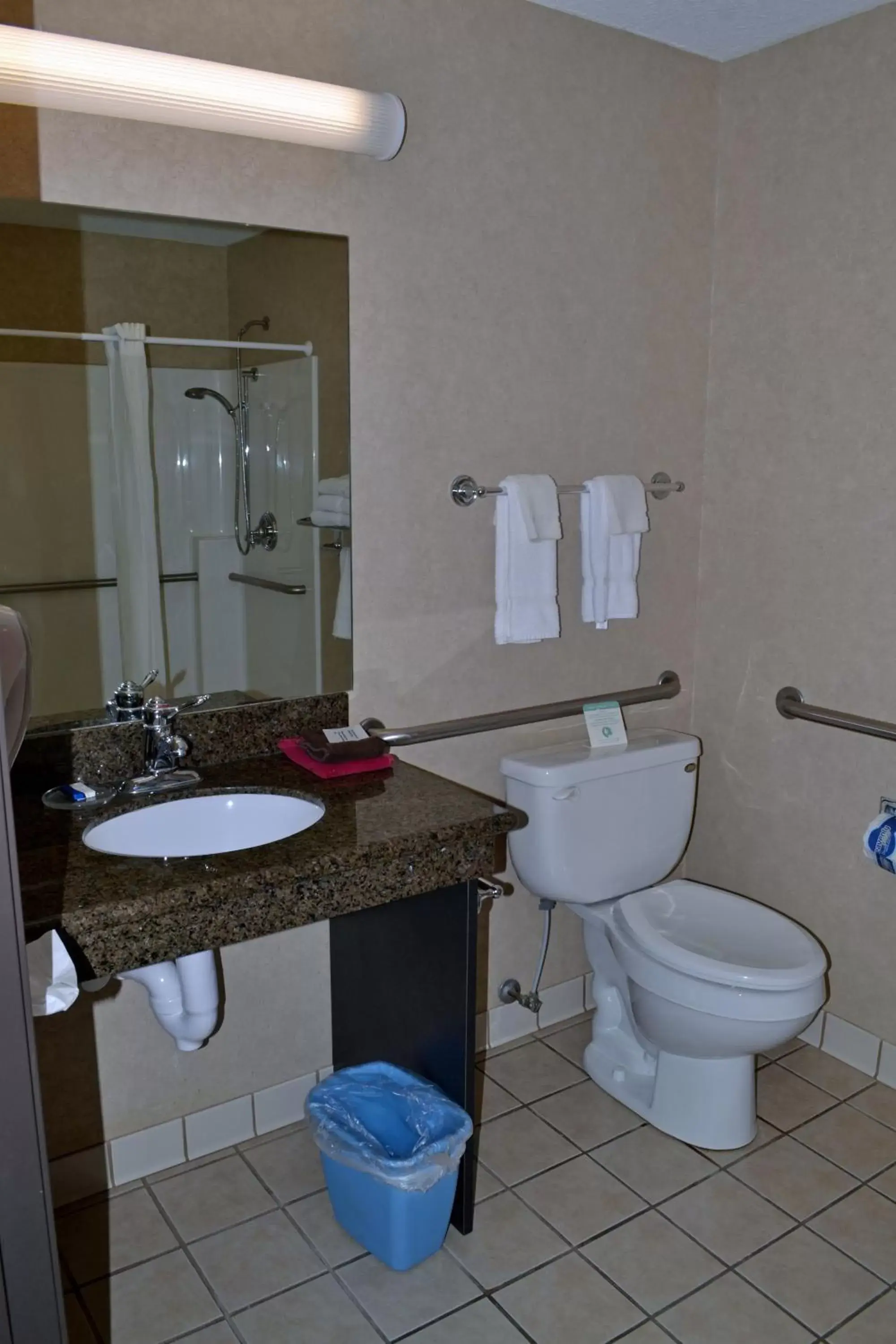 Bathroom in Paola Inn and Suites