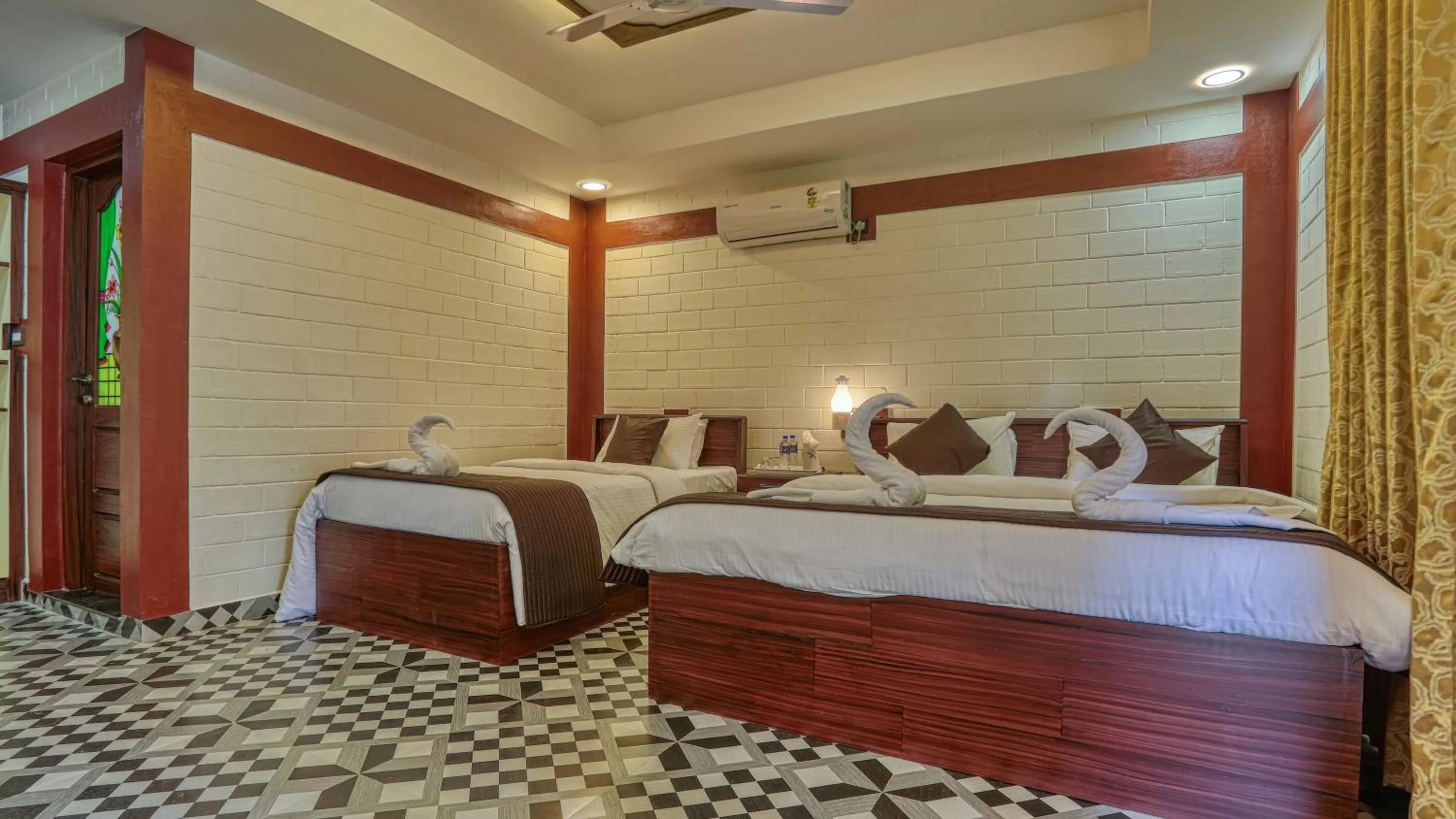 Bed in LEISURE VALLEY BEACH RESORT