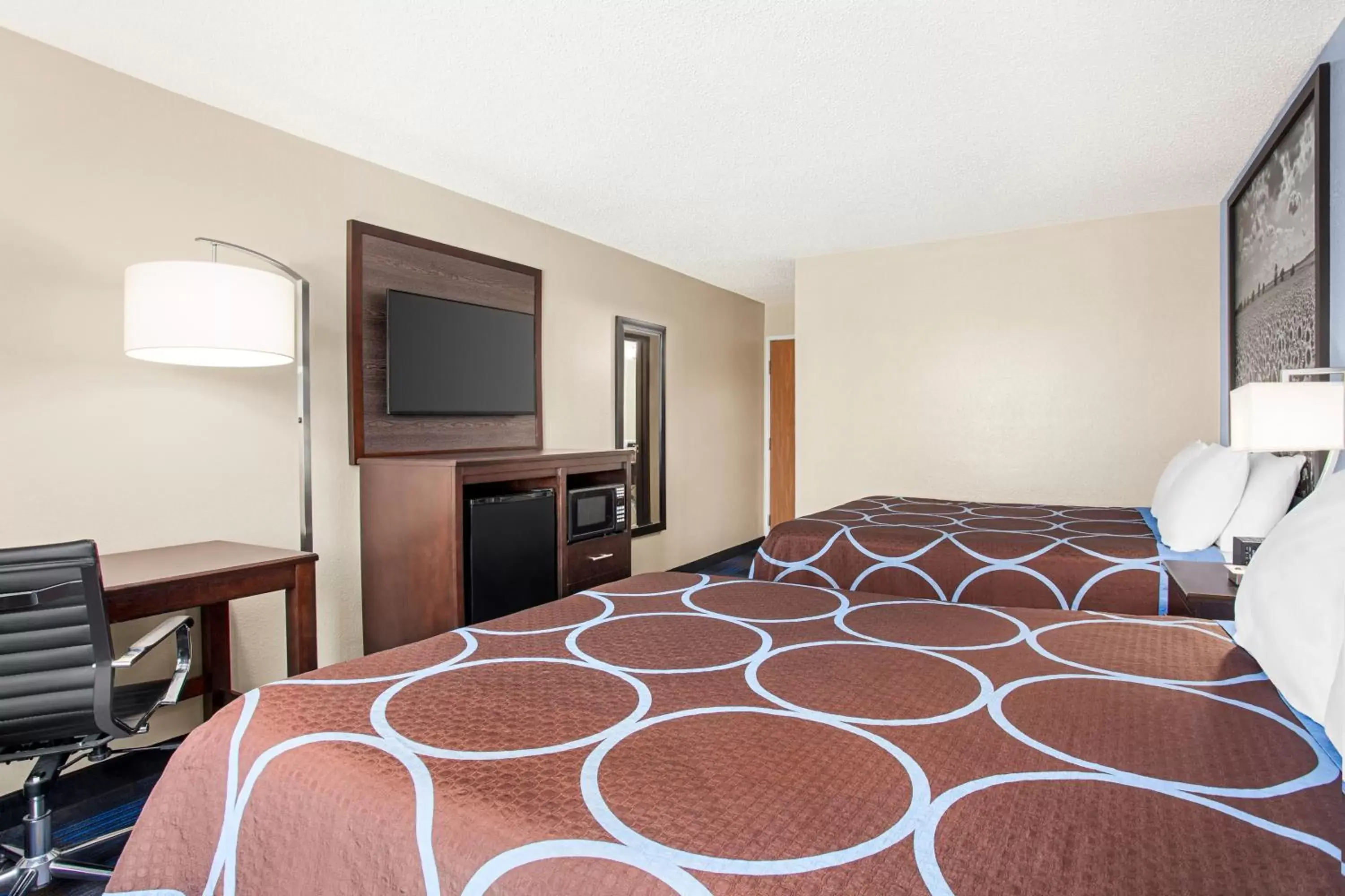Bed in Super 8 by Wyndham Lenexa Overland Park Area/Mall Area