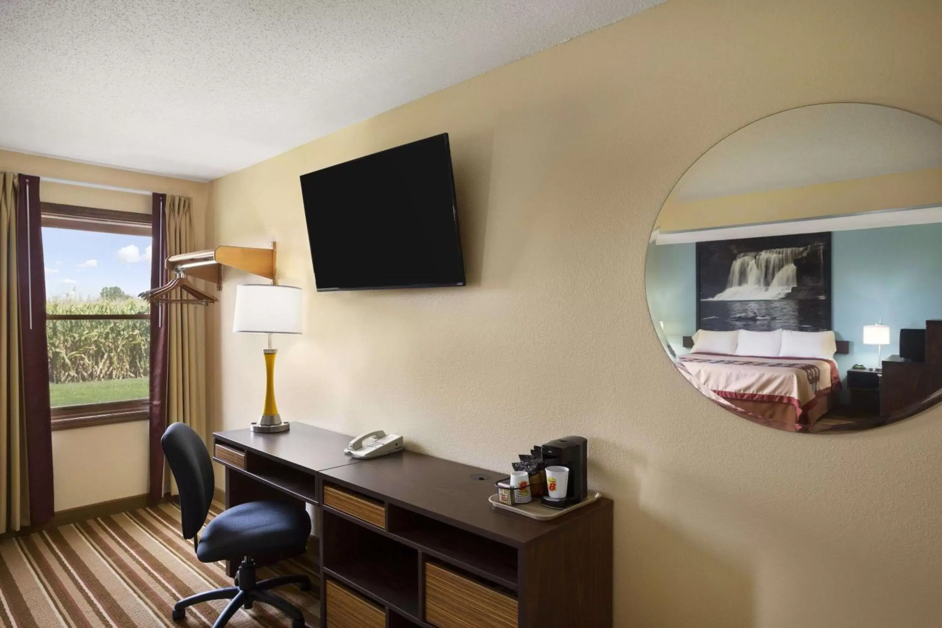 Photo of the whole room, TV/Entertainment Center in Super 8 by Wyndham Mattoon
