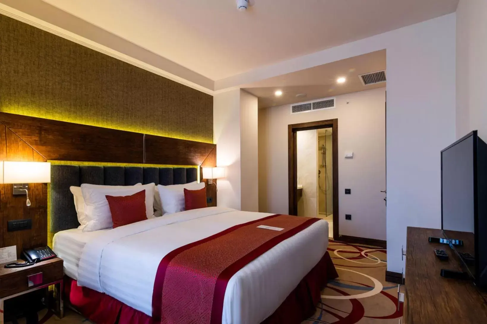 Bed in Ramada Hotel & Suites by Wyndham Yerevan