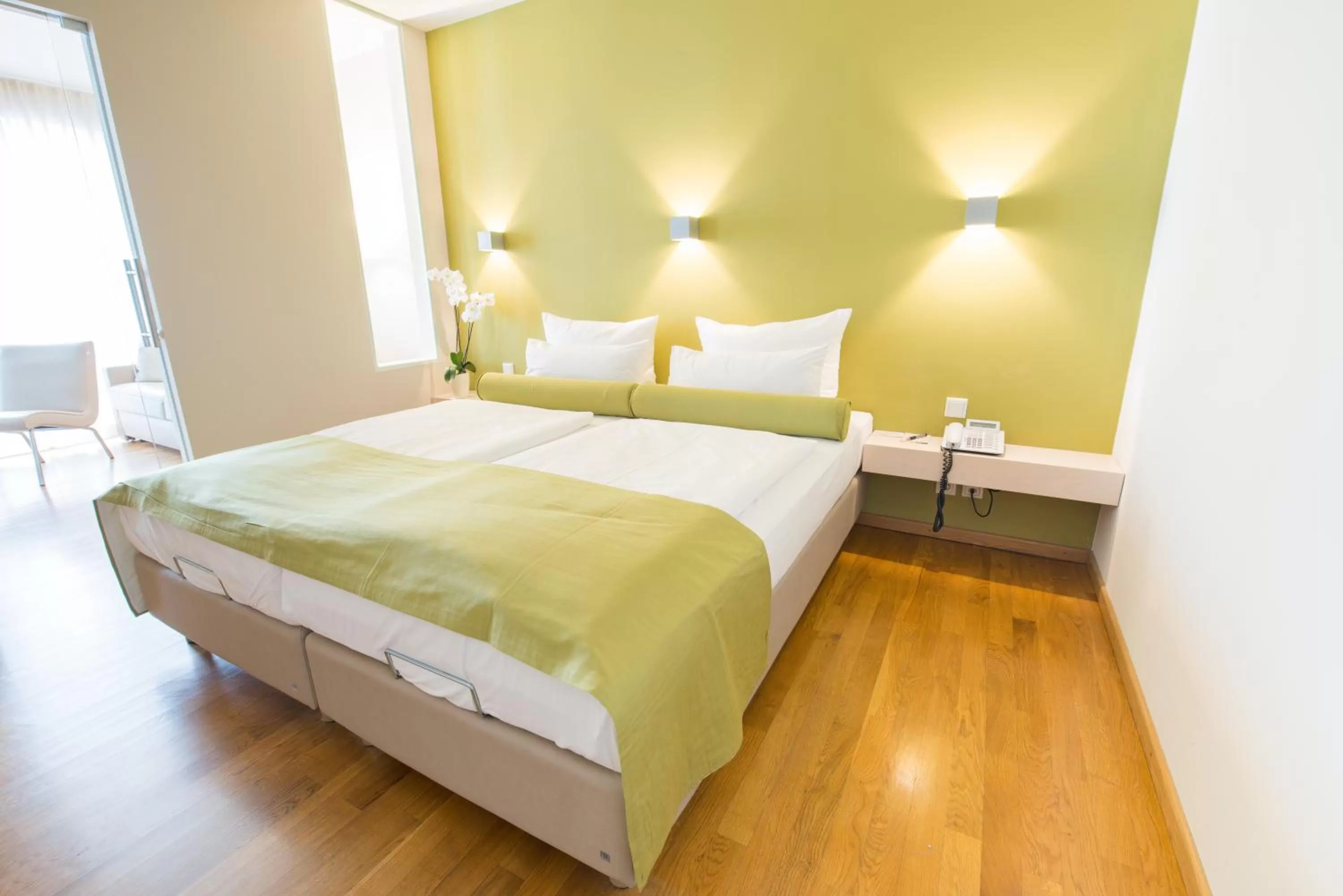 Bedroom, Bed in Nymphe Strandhotel & Apartments