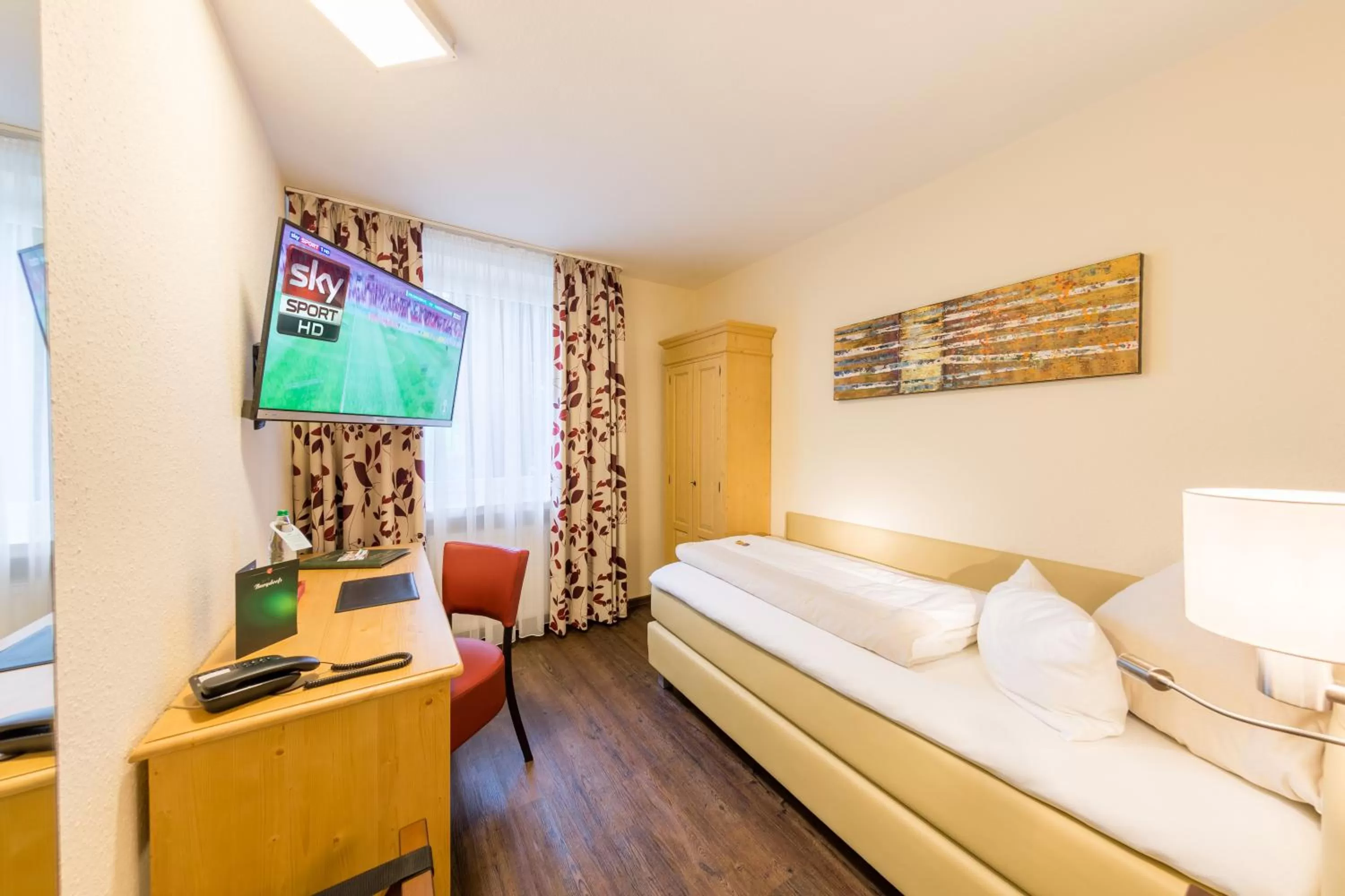 TV and multimedia, Bed in Burgdorfs Hotel & Restaurant