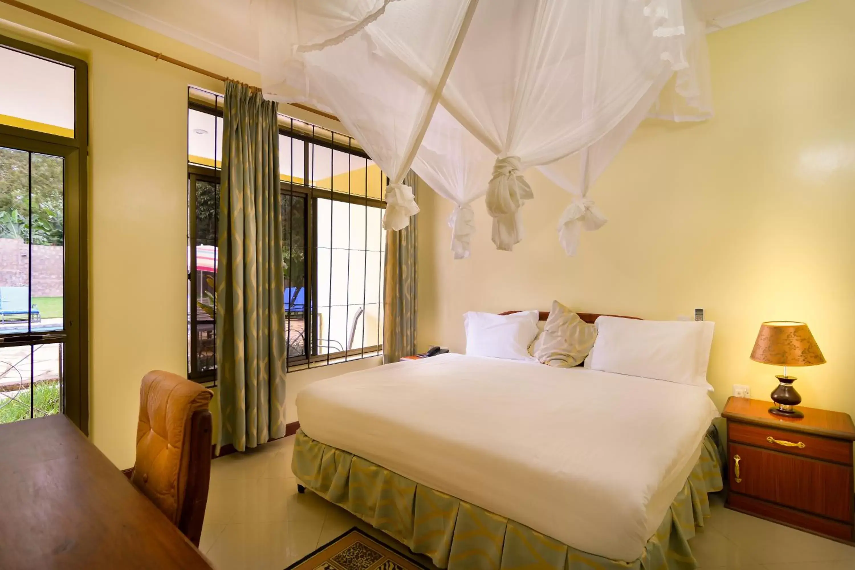 Bed in Mvuli Hotels Arusha