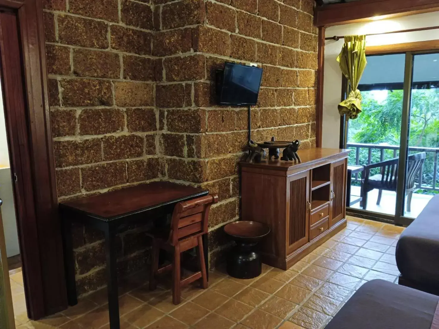 Photo of the whole room, TV/Entertainment Center in Faye Orchid Garden Resort