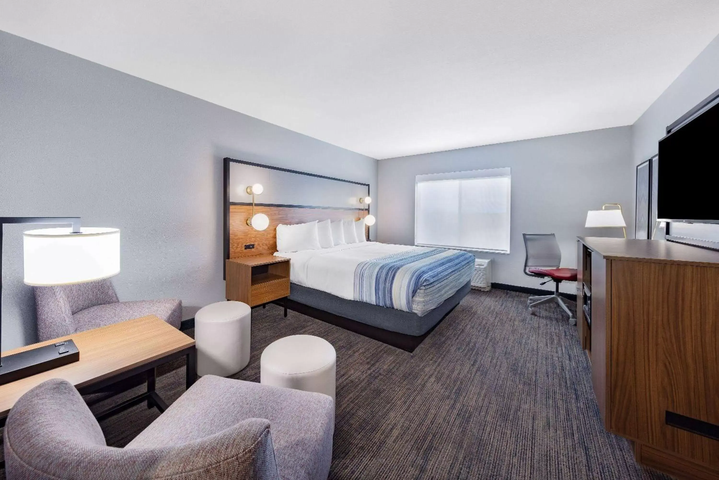 Photo of the whole room, Bed in AmericInn by Wyndham International Falls