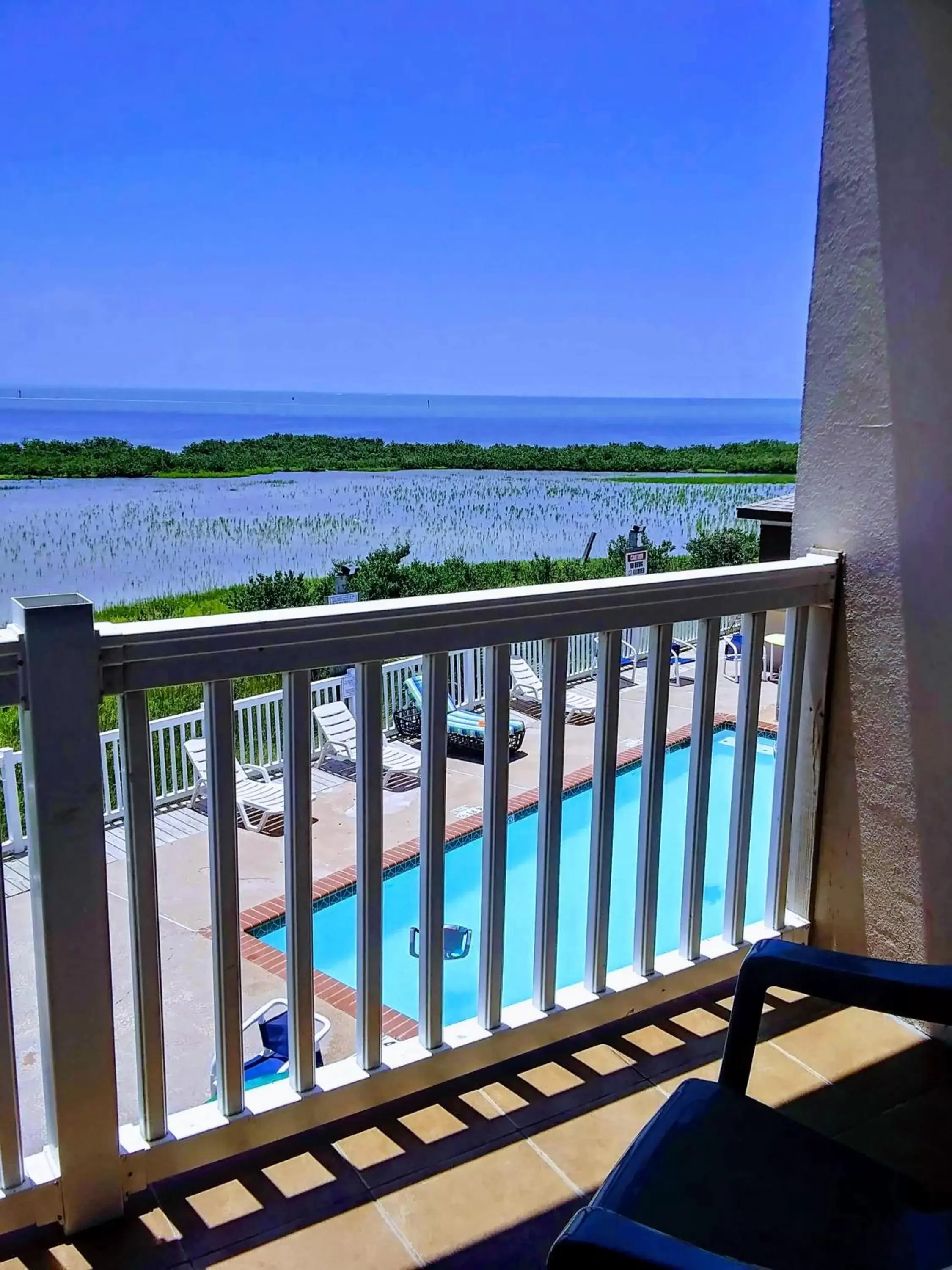 Balcony/Terrace, Pool View in Blue Bay Inn and Suites