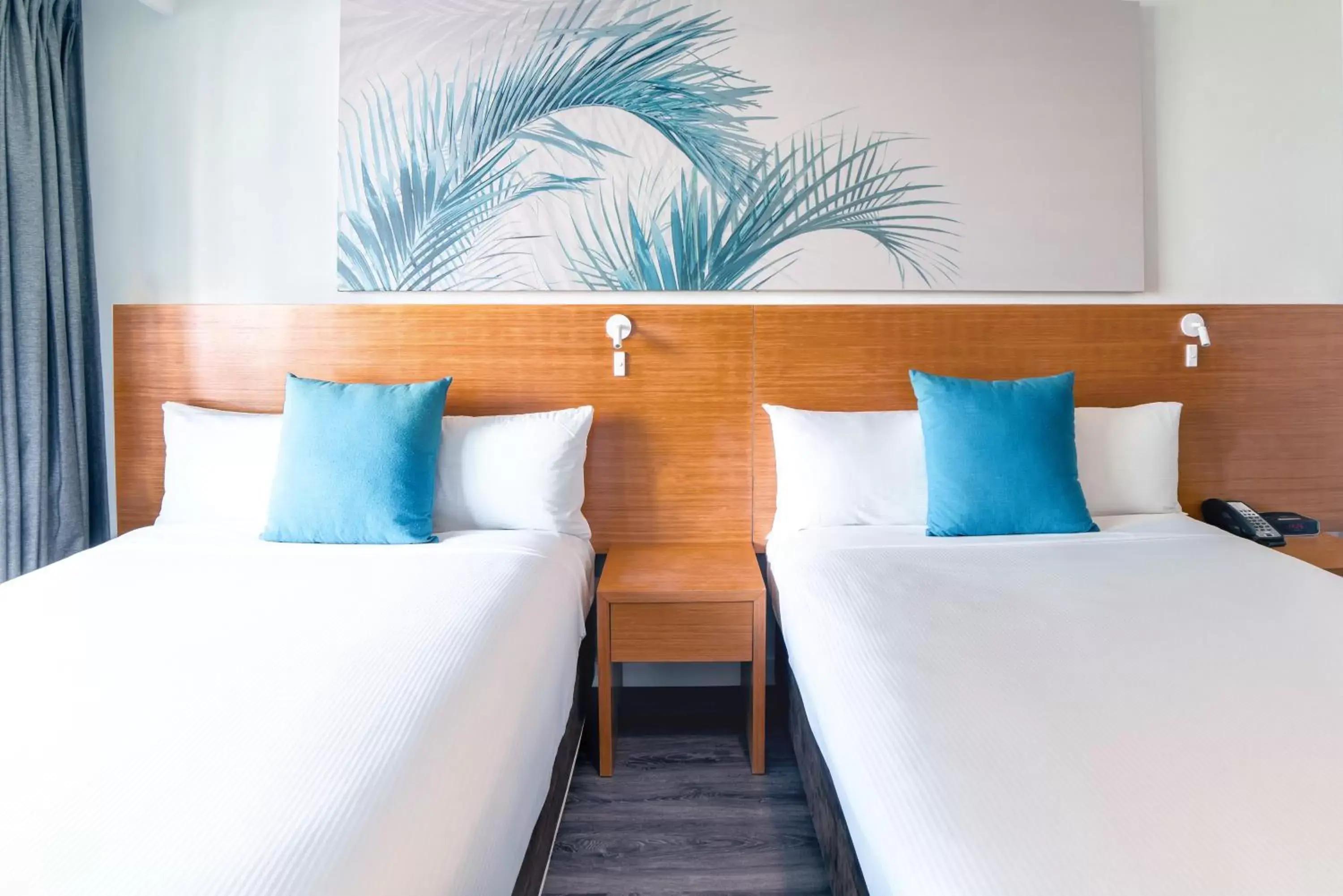 Bed in Novotel Cairns Oasis Resort