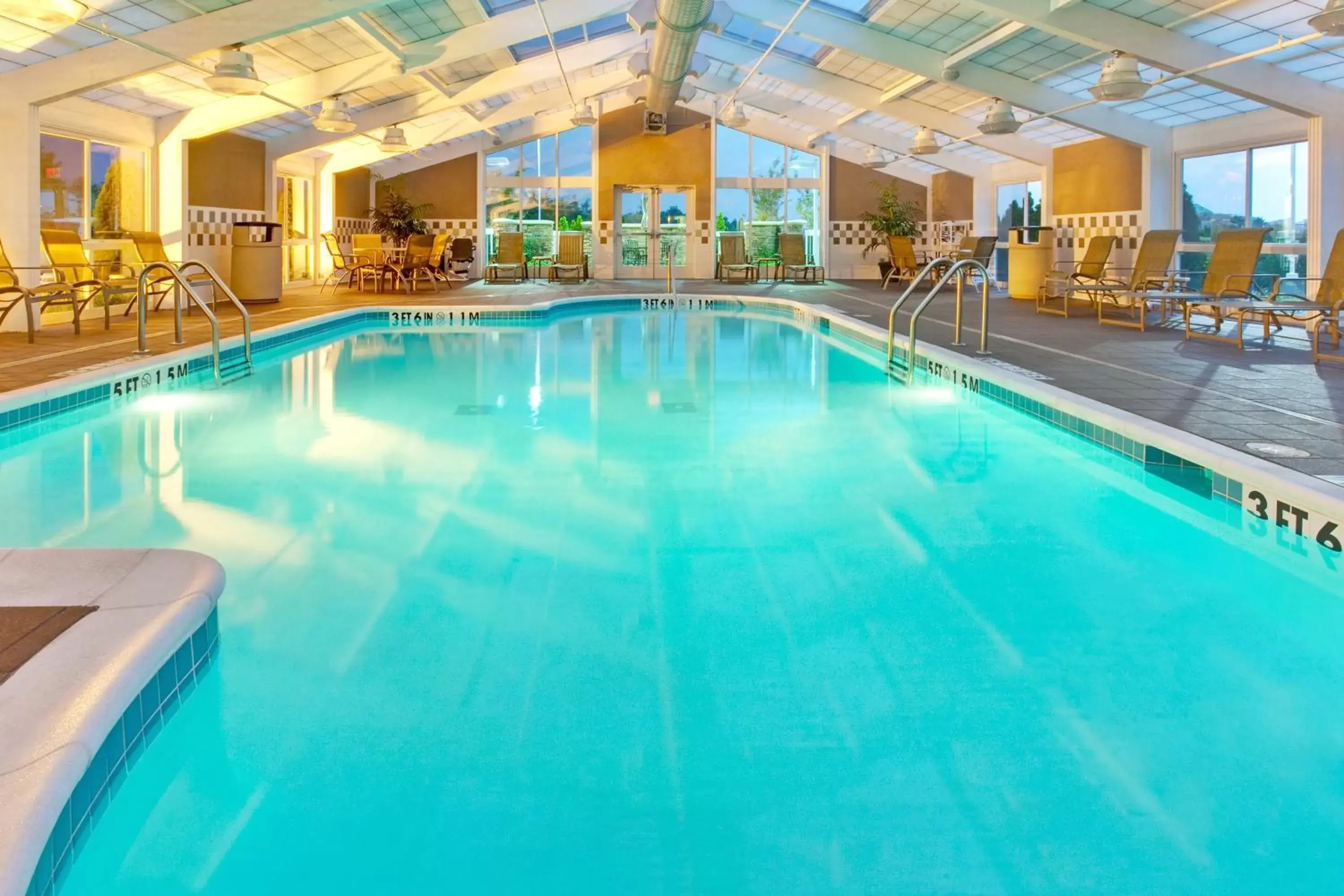 Swimming Pool in Holiday Inn Hotel & Suites Memphis-Wolfchase Galleria, an IHG Hotel