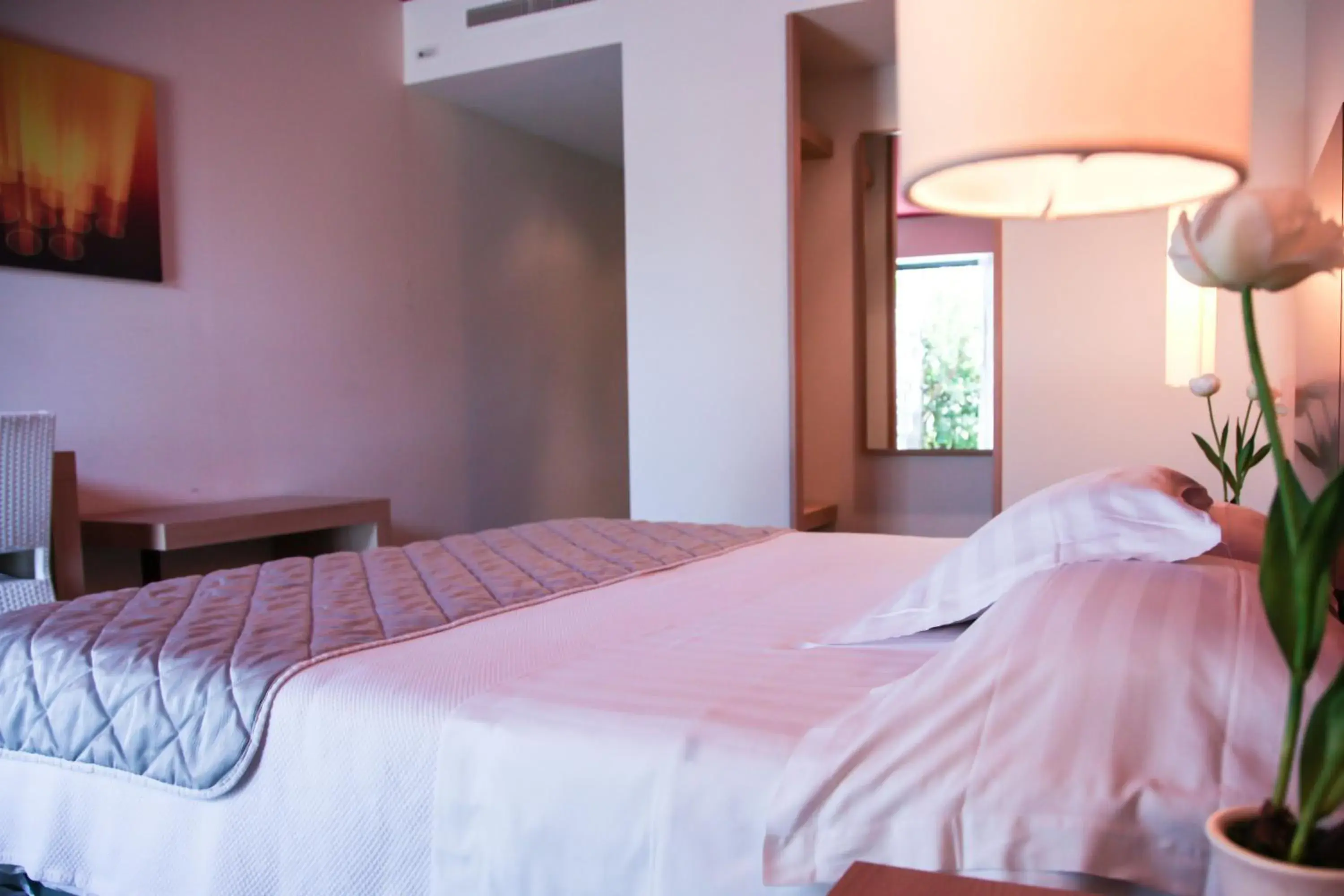 Bed in Esperia Palace Hotel & Resort Spa