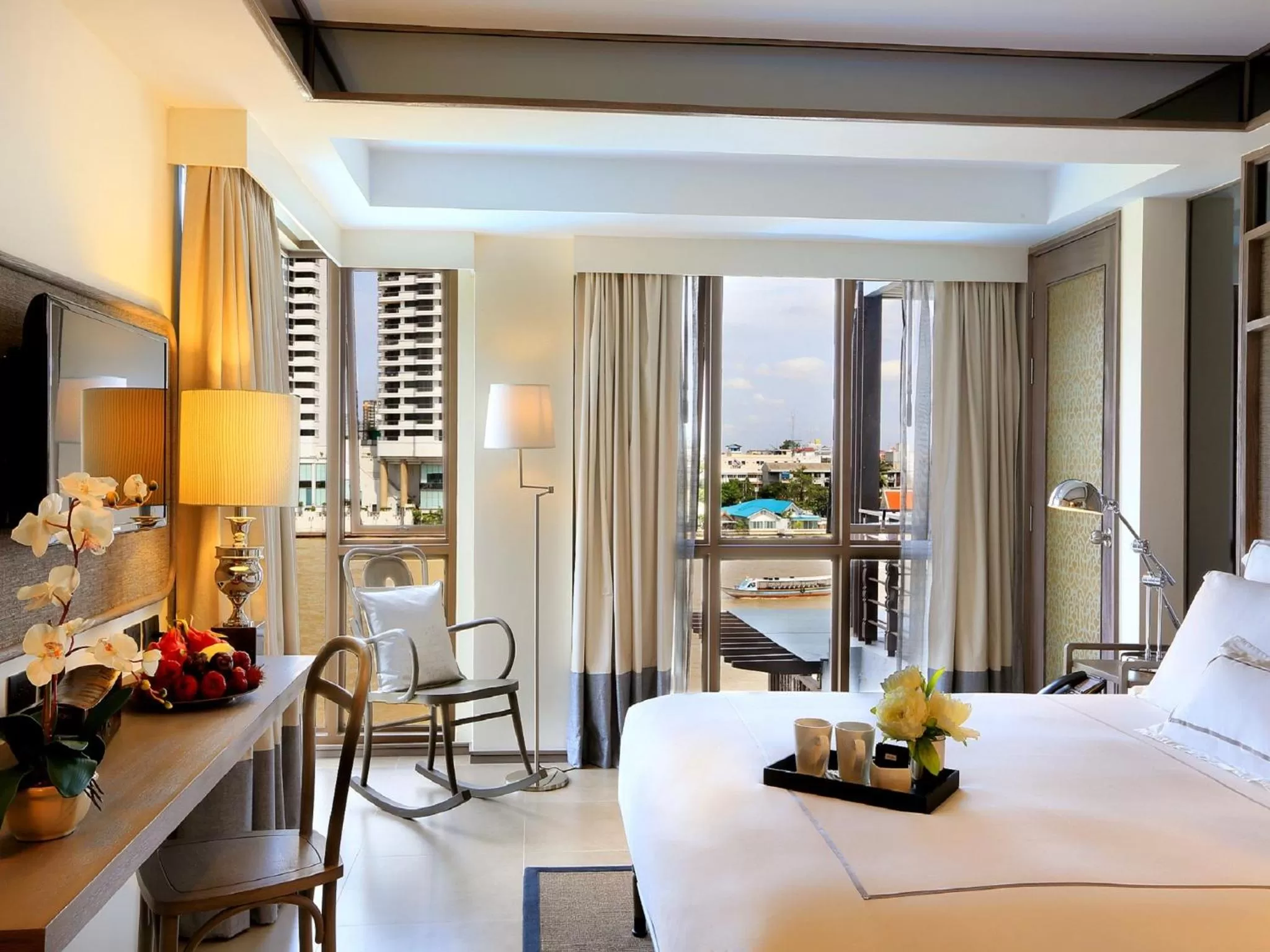 Photo of the whole room, Bed in Riva Surya Bangkok