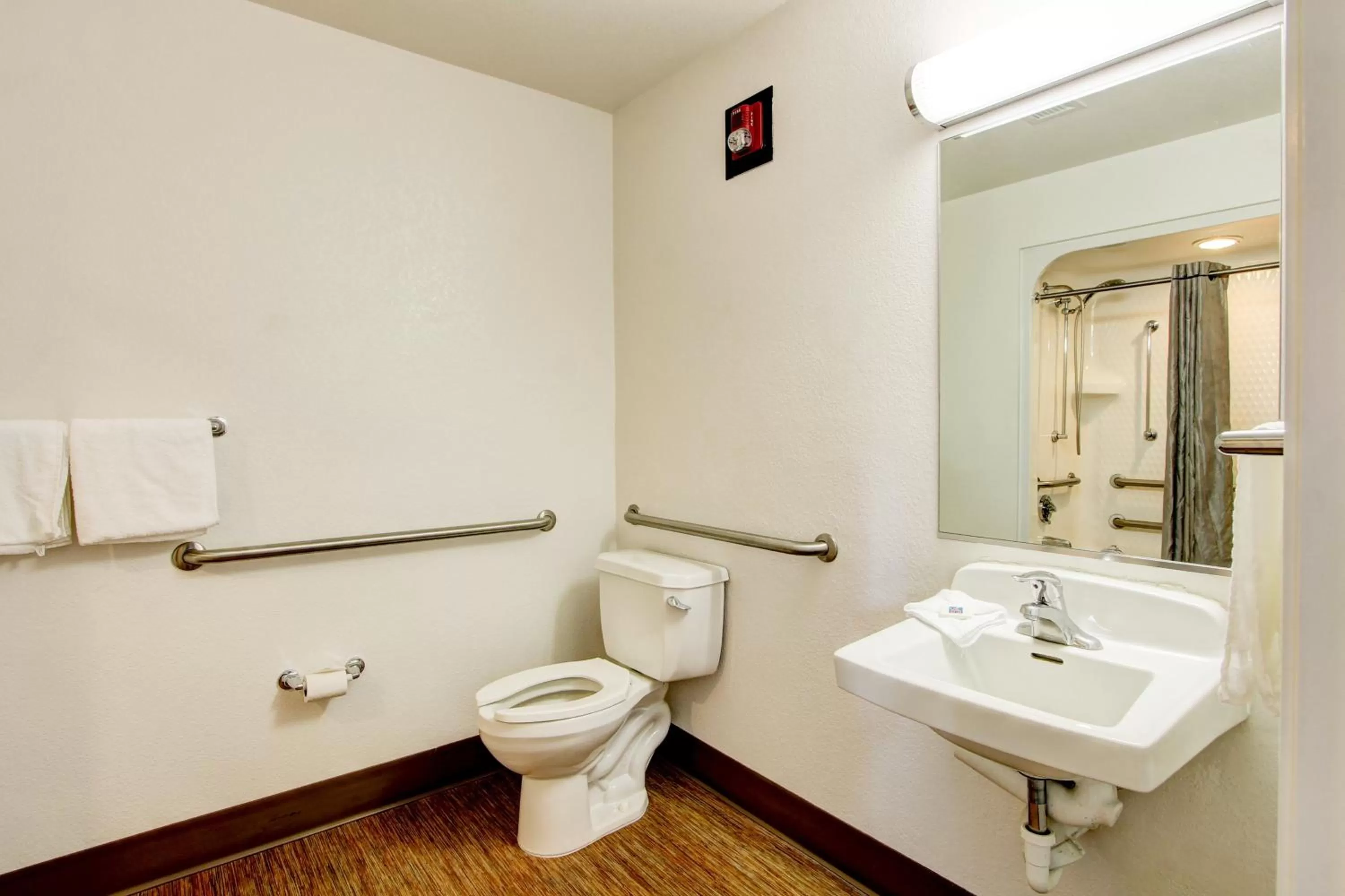 Toilet in Super 8 by Wyndham Aurora East