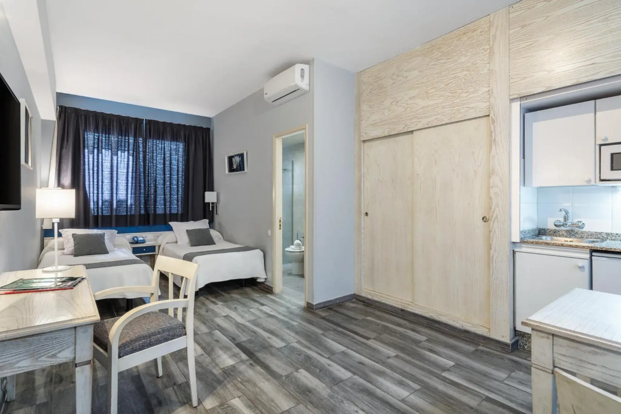 Photo of the whole room in Apartamentos Colón Playa Photo of the whole room in Apartamentos Colón Playa