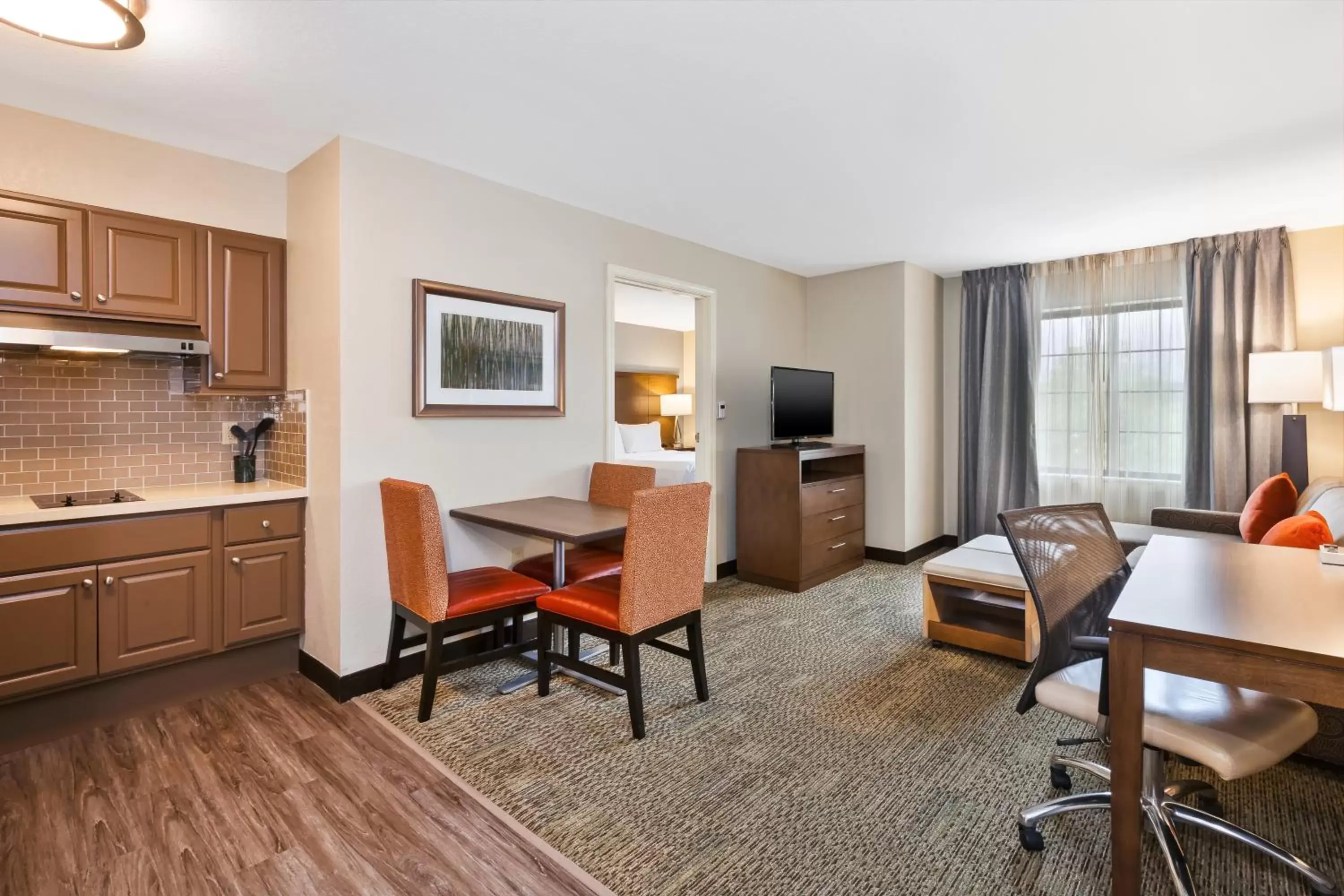 Photo of the whole room, Seating Area in Staybridge Suites Kalamazoo, an IHG Hotel