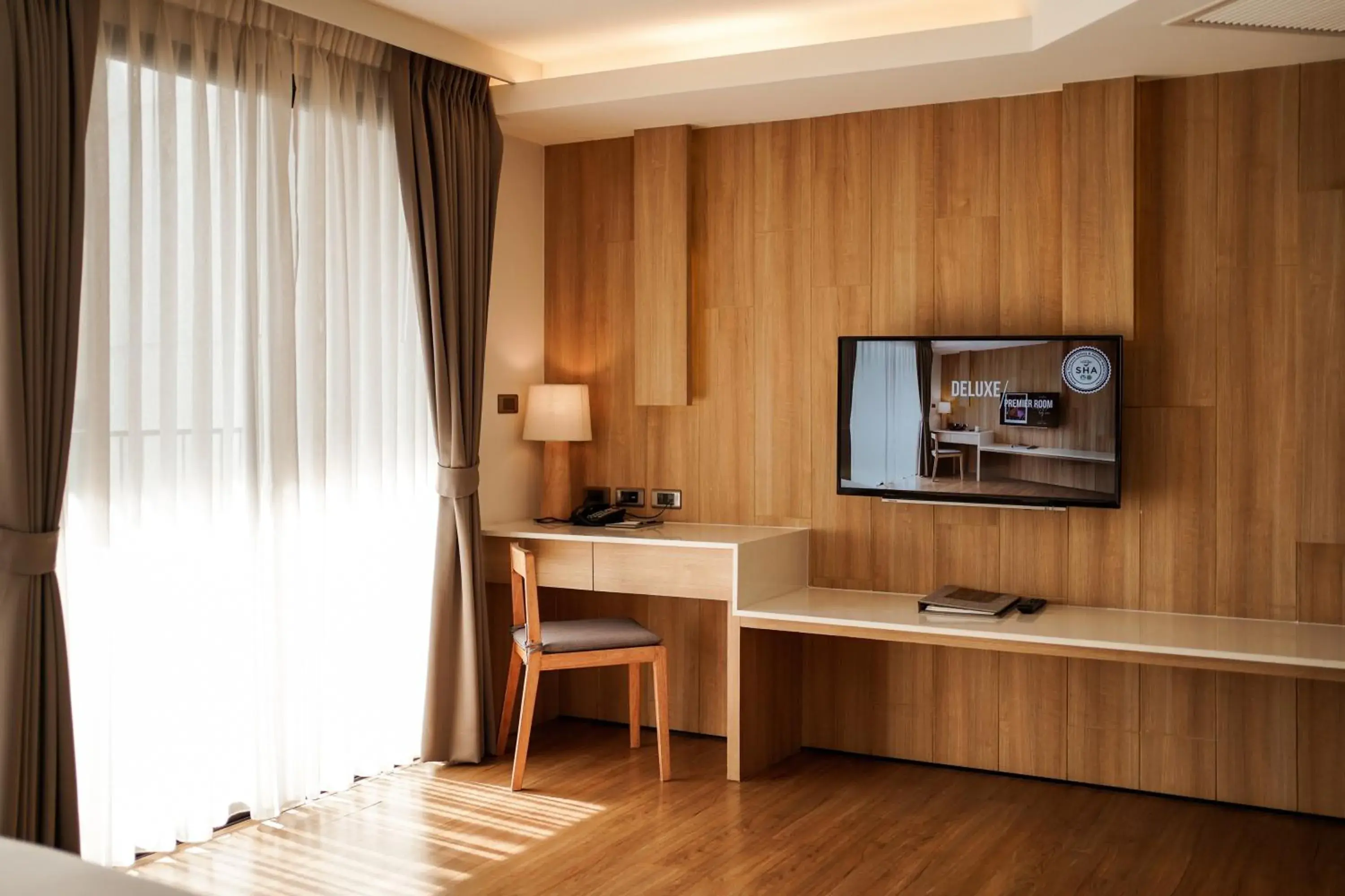 Photo of the whole room, TV/Entertainment Center in Brique Hotel Chiangmai