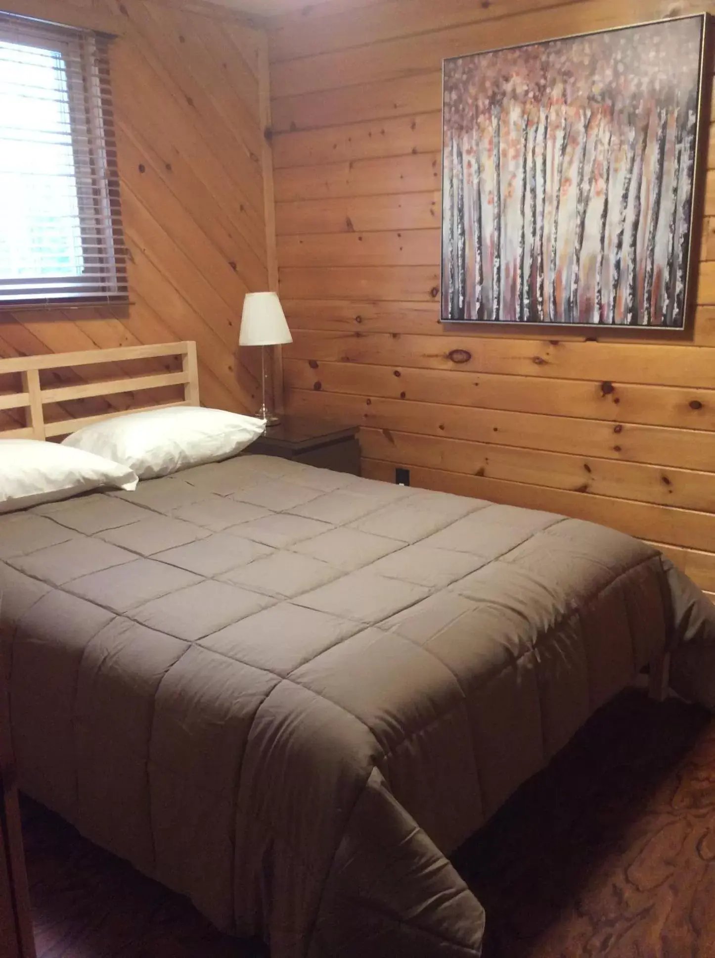 Bed in Madawaska Lodge