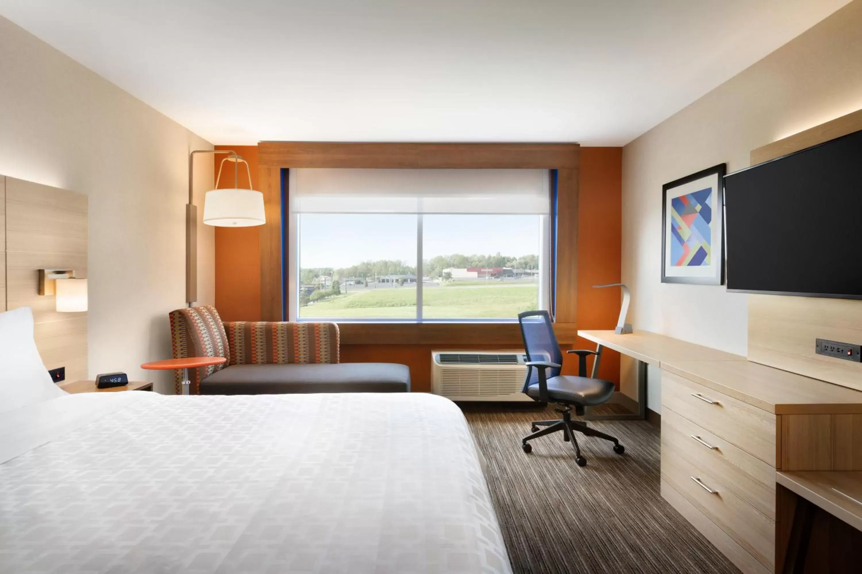 Photo of the whole room, TV/Entertainment Center in Holiday Inn Express - Indiana, an IHG Hotel