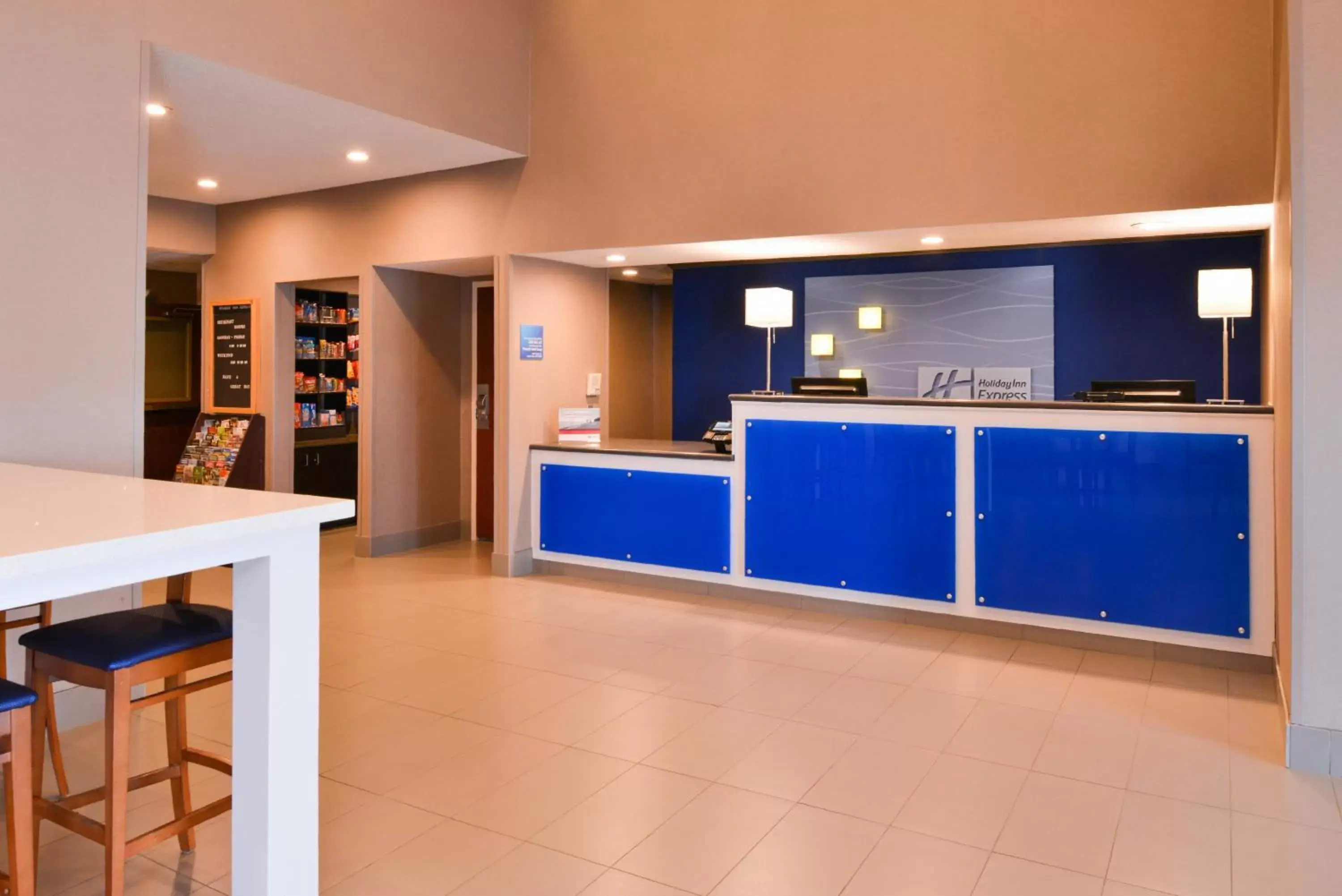 Lobby or reception, Kitchen/Kitchenette in Holiday Inn Express Hotel & Suites North Little Rock, an IHG Hotel