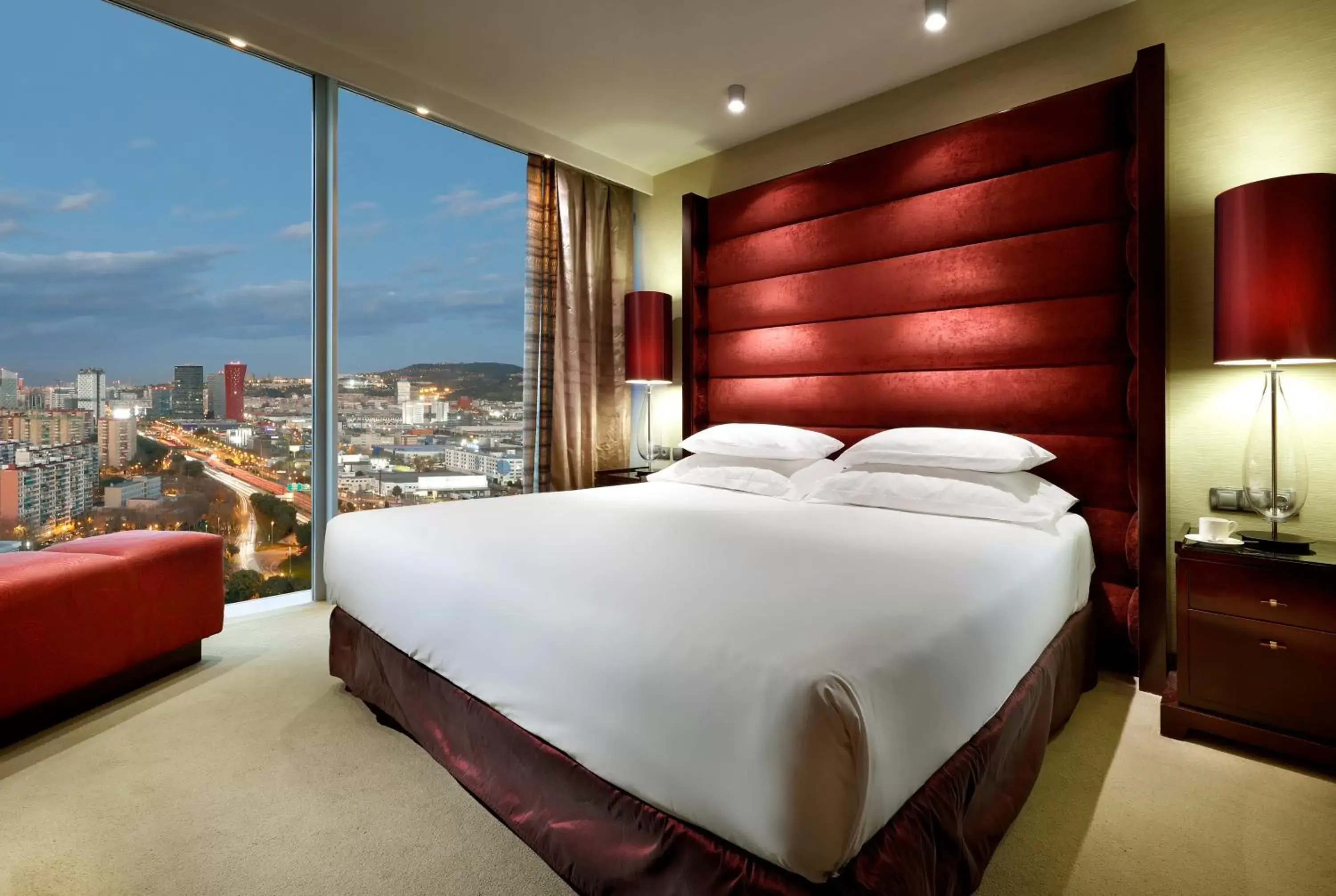 Bed in Hyatt Regency Barcelona Tower