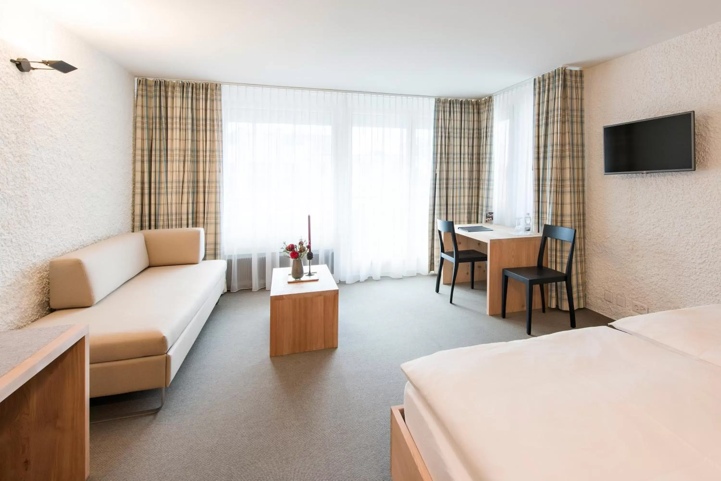 Photo of the whole room, Seating Area in Hauser Hotel St. Moritz