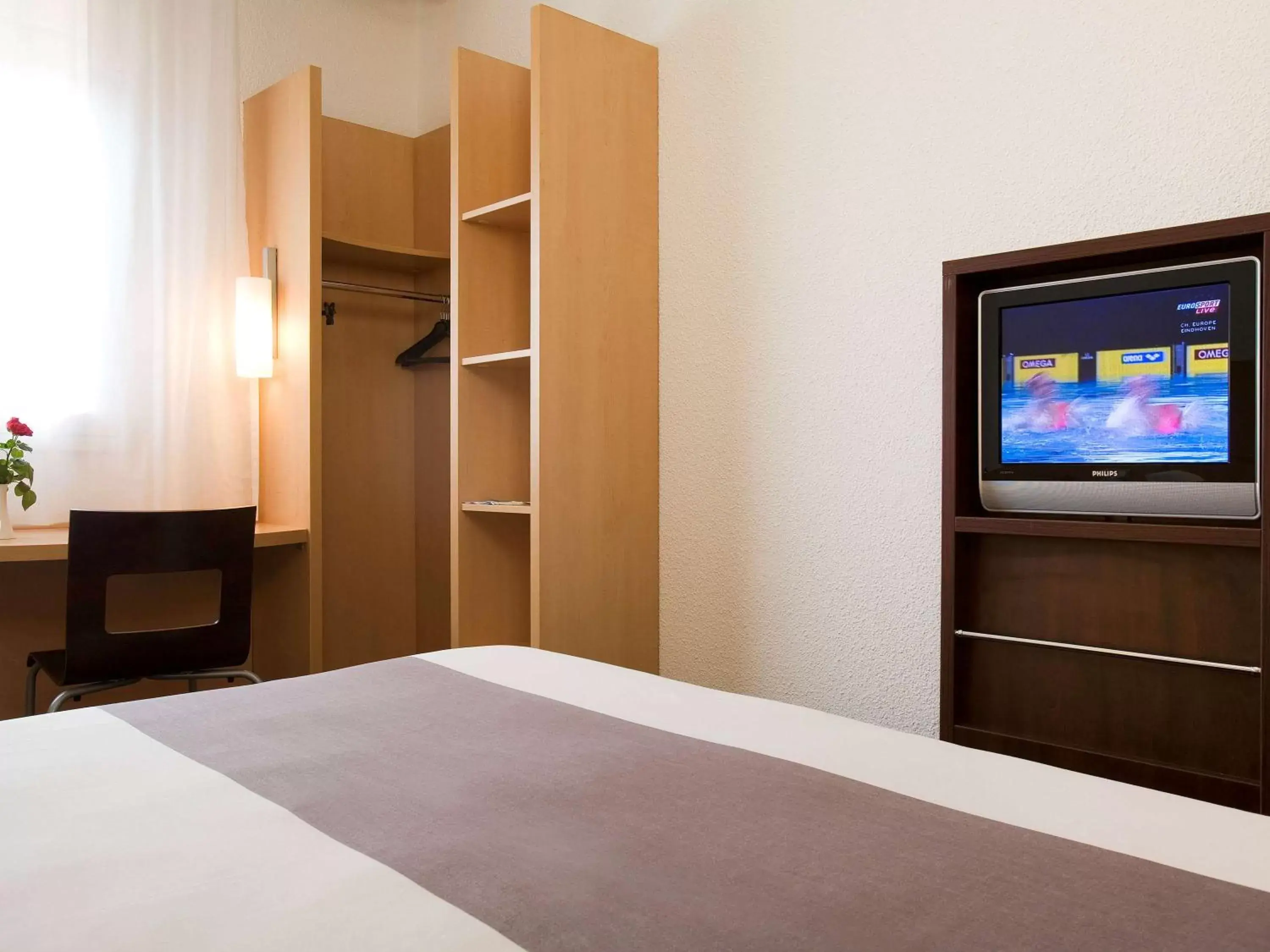 Photo of the whole room, TV/Entertainment Center in Ibis Cotonou