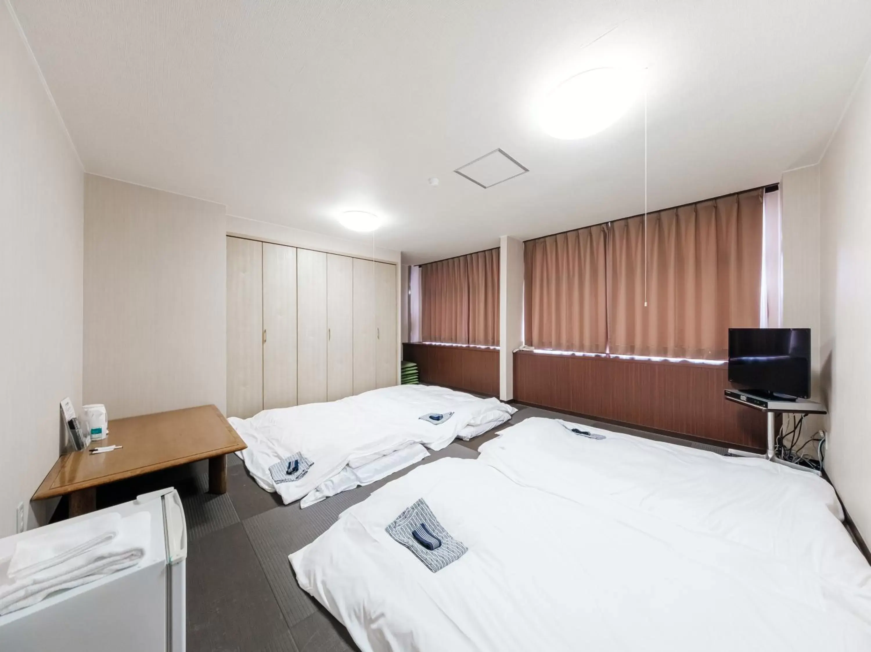 Bed in Tabist Hotel Tetora Hakodate Station