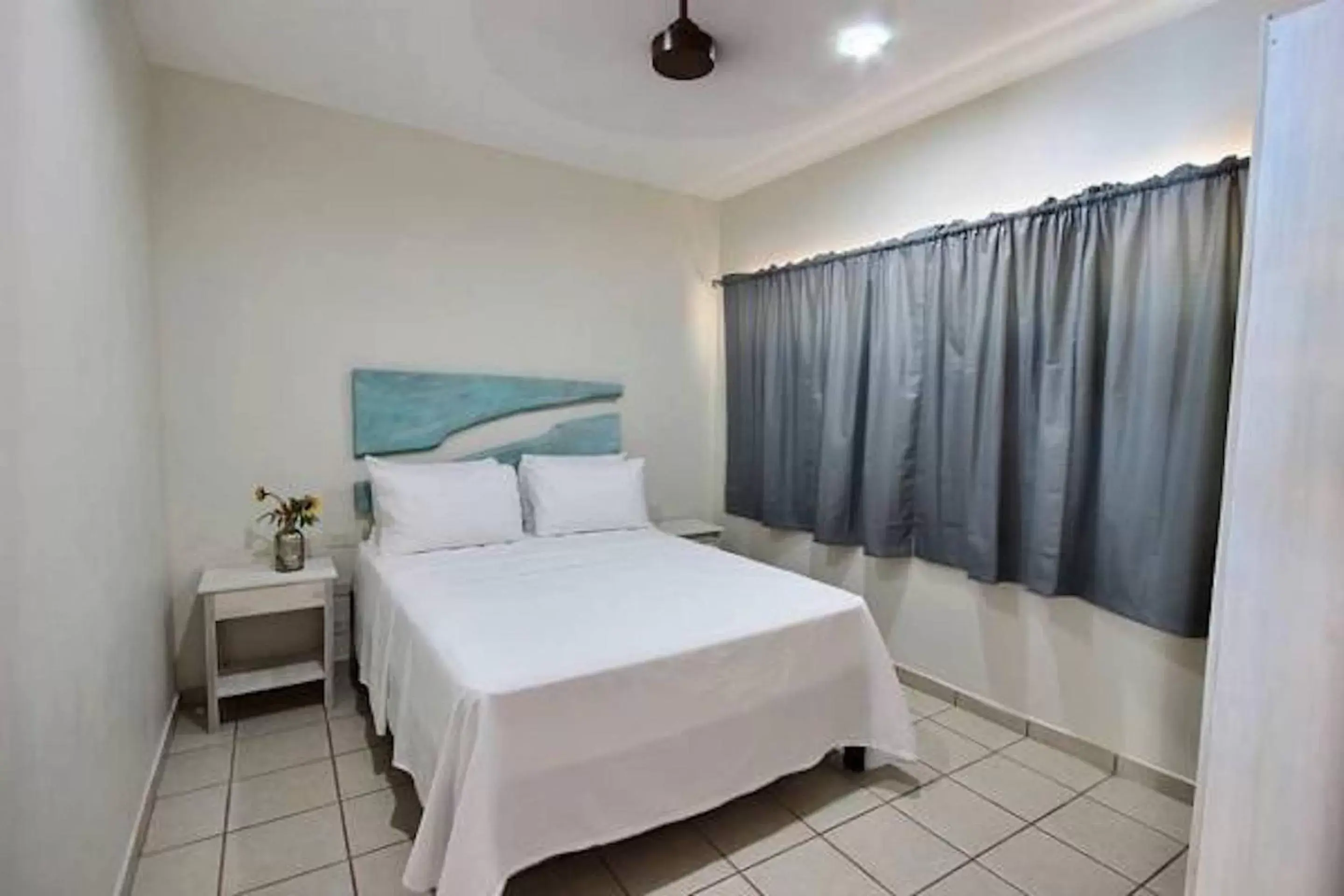 Bed in Ten North Tamarindo Beach Hotel