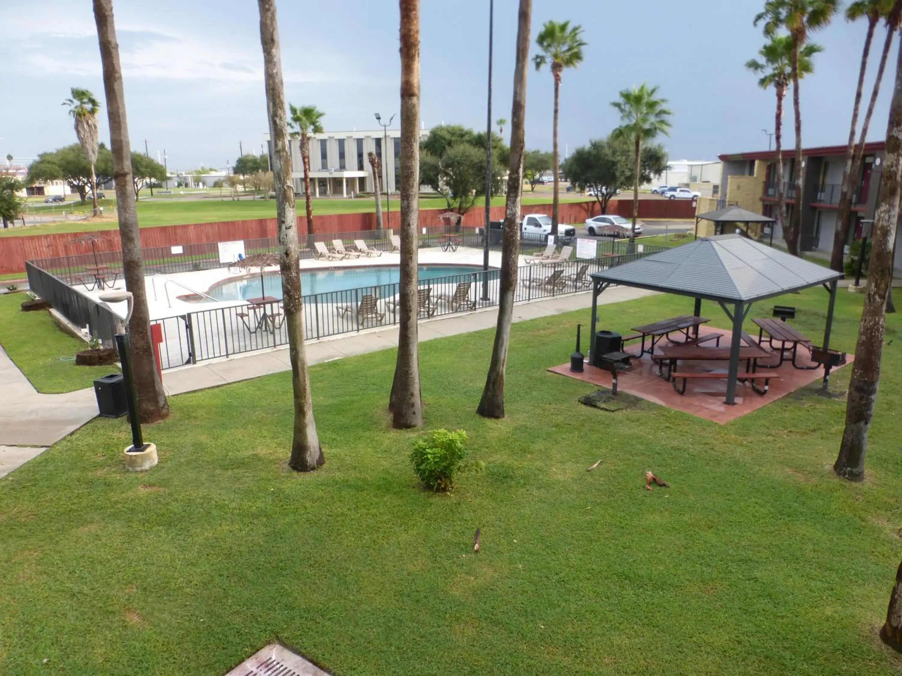Pool view, Children's Play Area in Red Roof Inn Corpus Christi North - Near Downtown