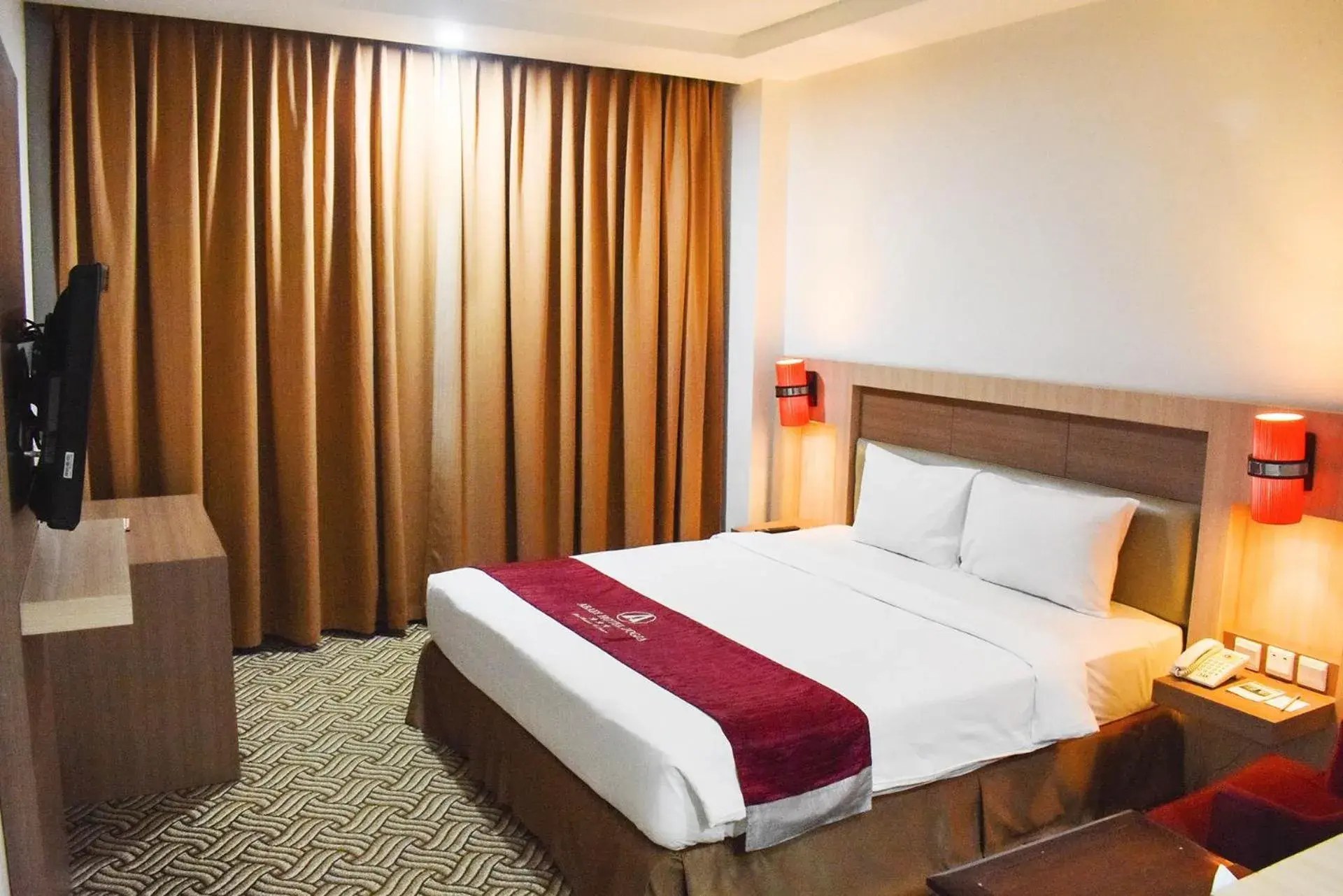 Bedroom, Bed in Abadi Hotel Malioboro Yogyakarta by Tritama Hospitality