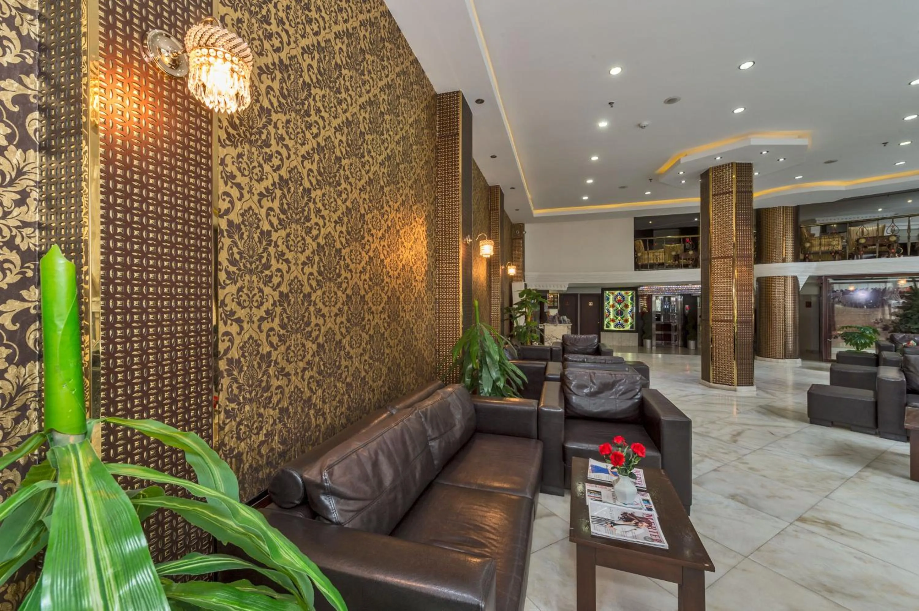 Communal lounge/ TV room in Kuran Hotel International