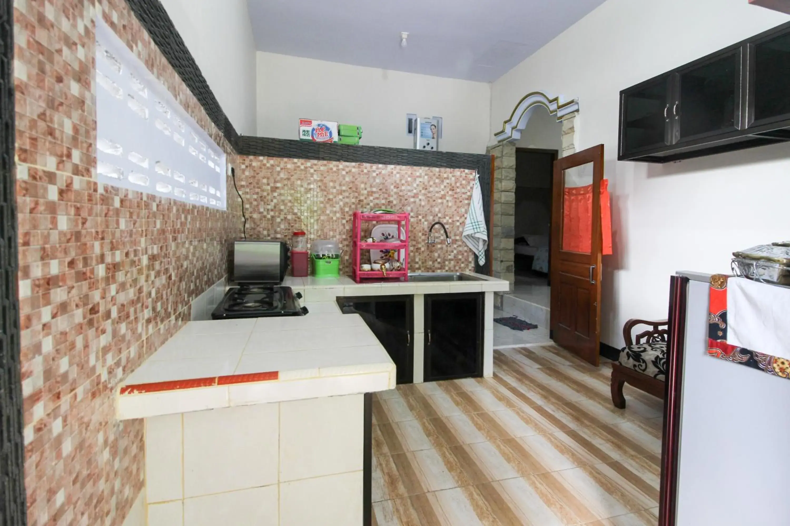 Kitchen or kitchenette, Kitchen/Kitchenette in RedDoorz near Museum Gunung Merapi