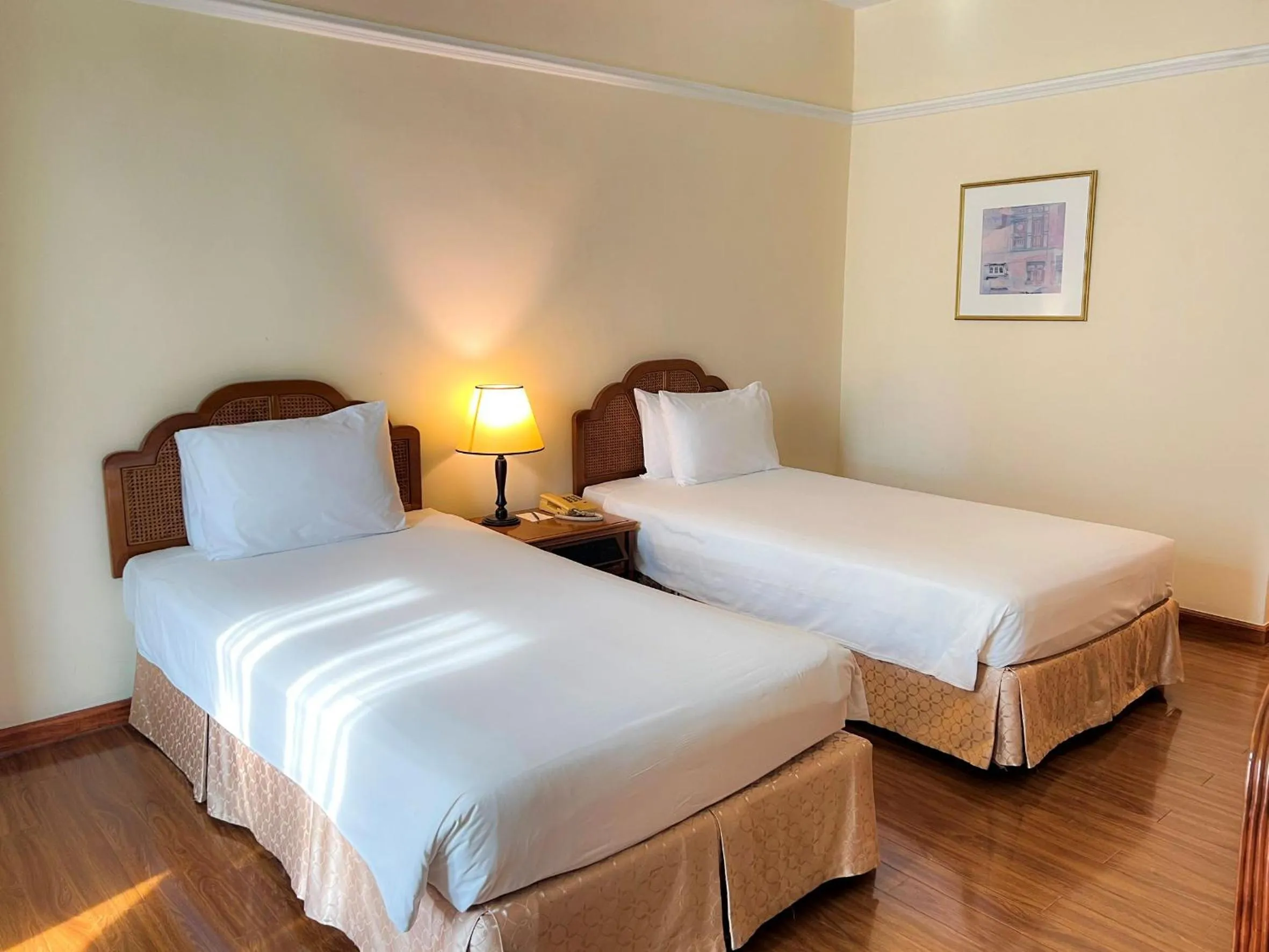 Bed in Ramana Saigon Hotel