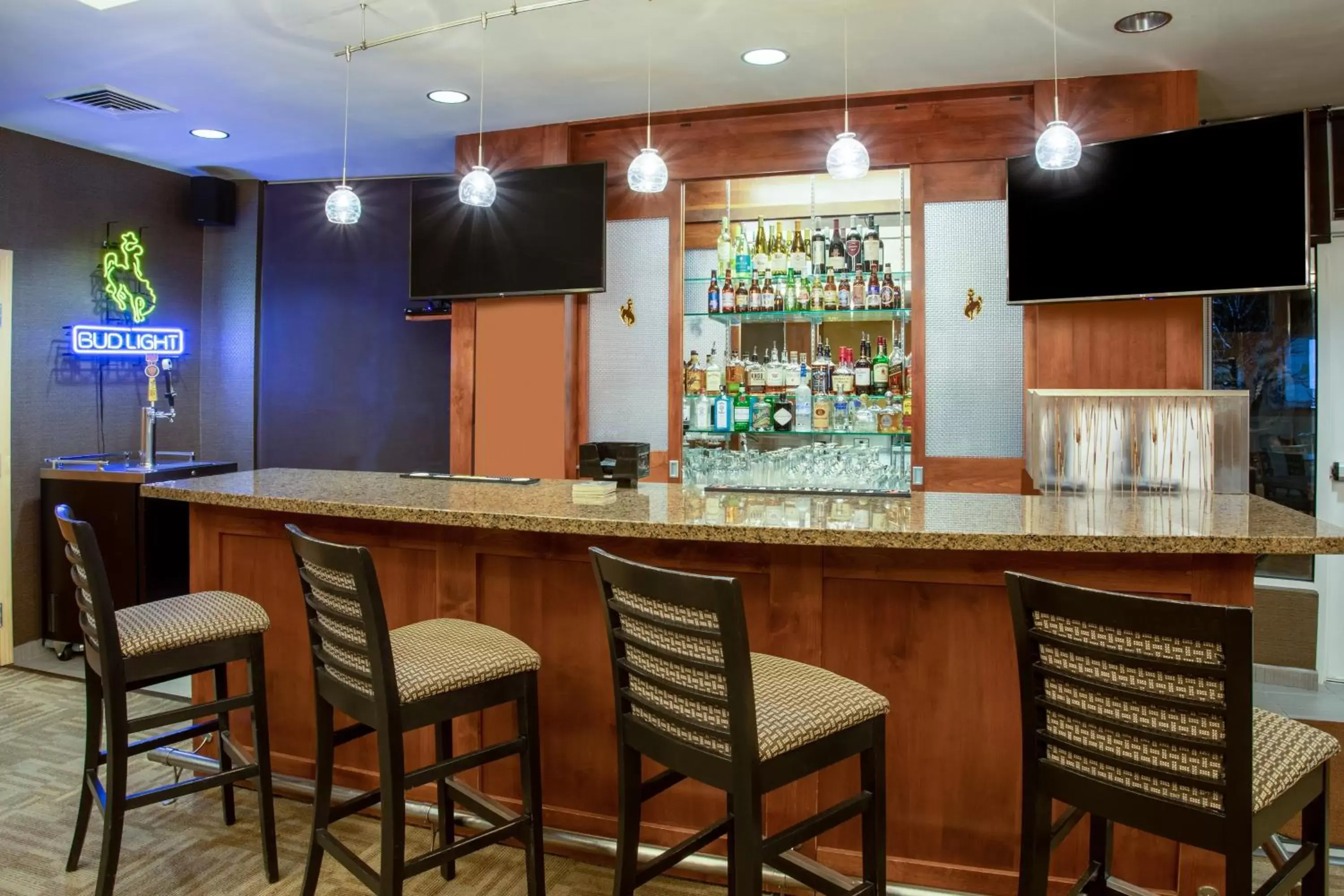 Lounge or bar, Lounge/Bar in Holiday Inn Laramie, an IHG Hotel