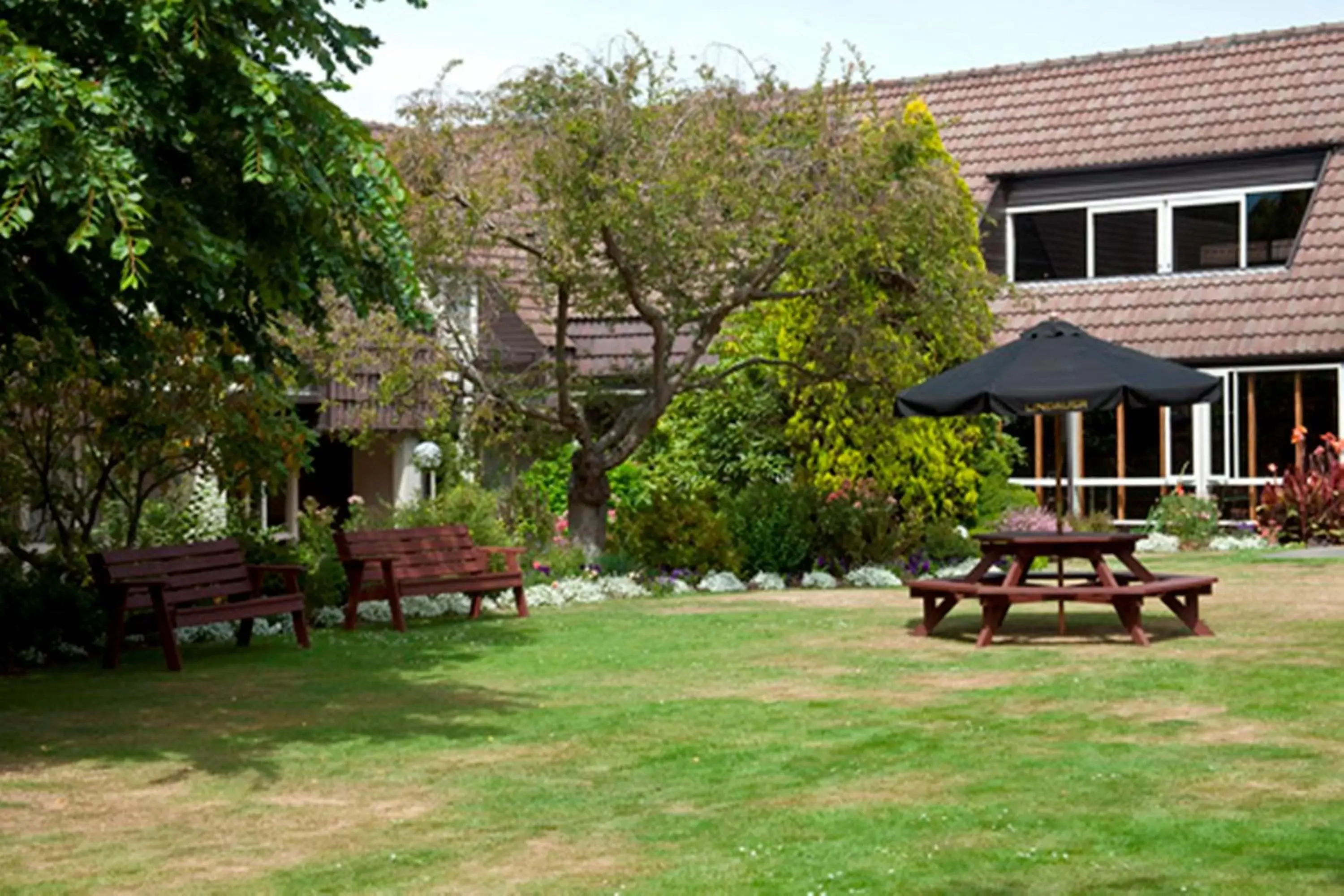 Garden in Dunedin Leisure Lodge - Distinction