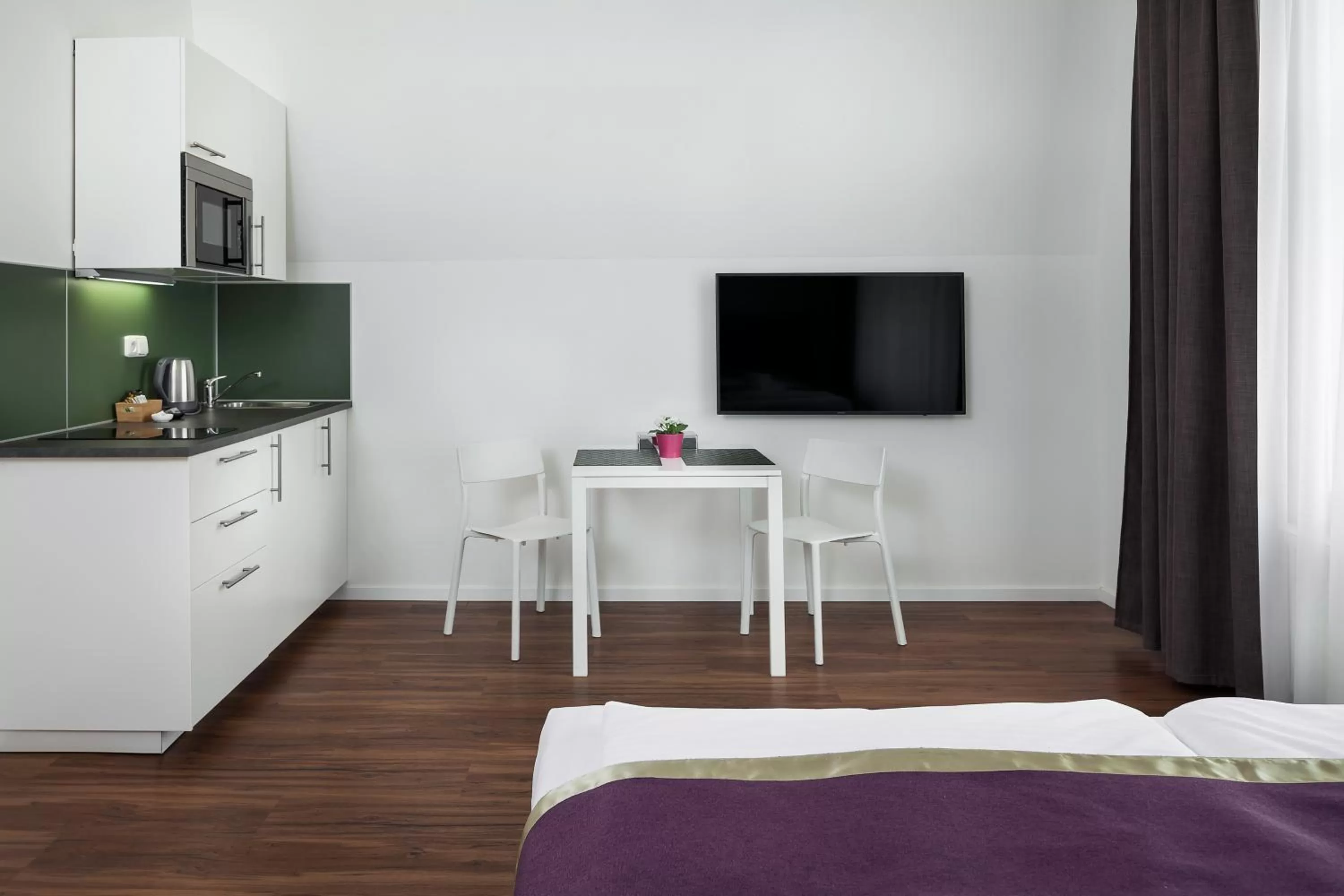 Bed in Elizabeth Suites