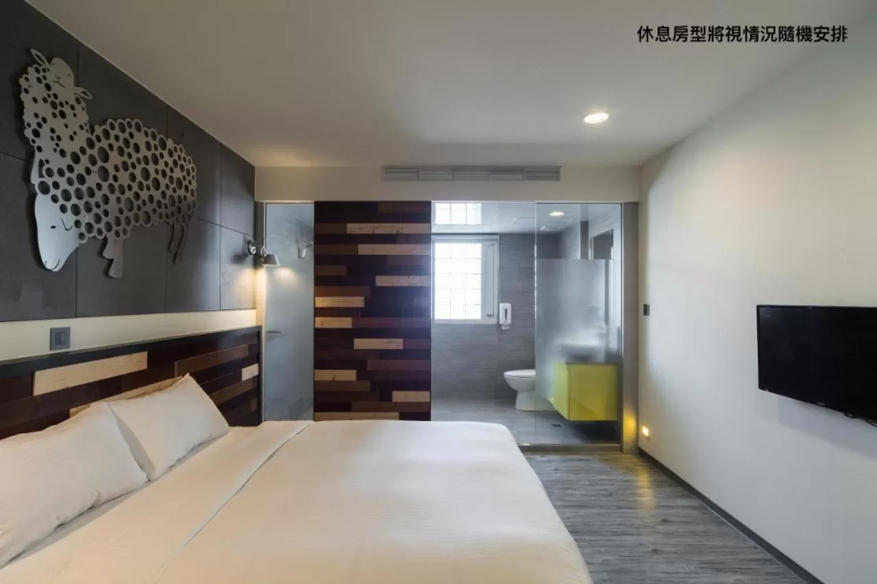 Bed in Xinshe Hotel - Hsinchu