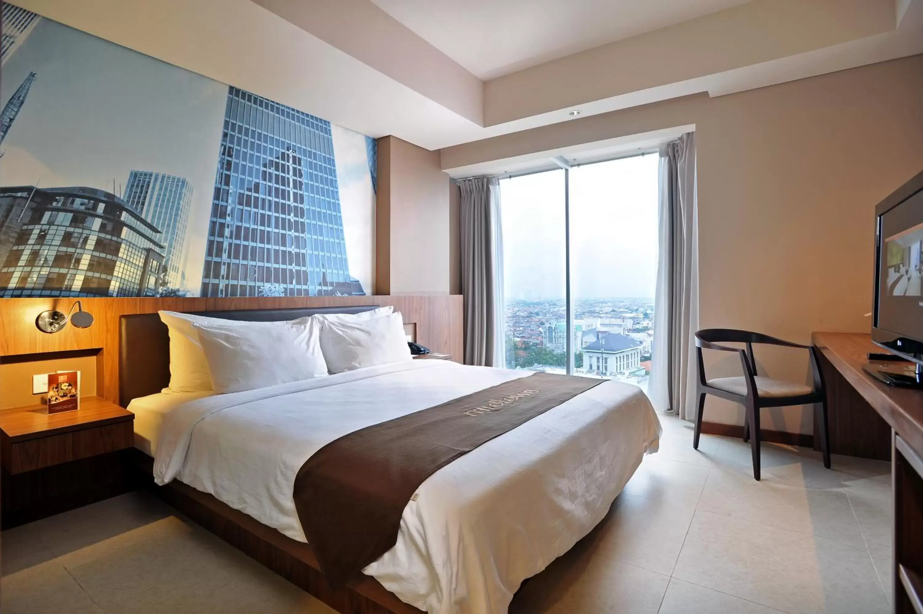 Photo of the whole room, Bed in Midtown Hotel Surabaya